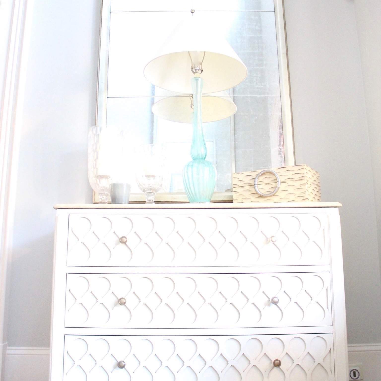 Bright Foyer Decor details. Hall chest with turquoise lamps.