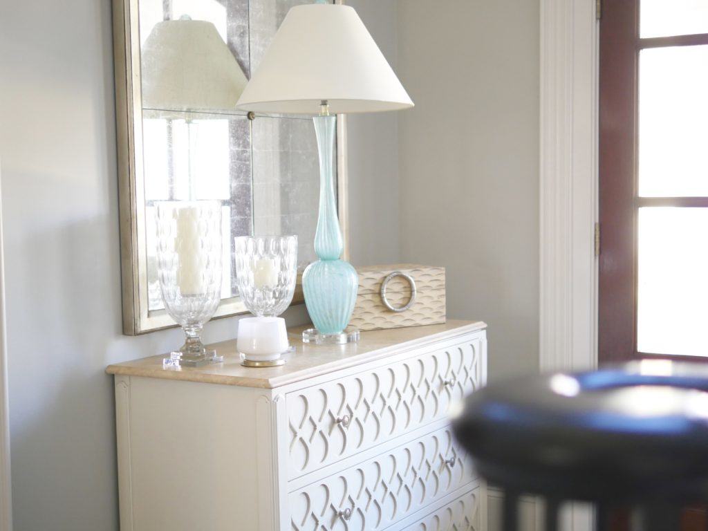 Hickory White Chest with mint blue table and Global Views accessories.