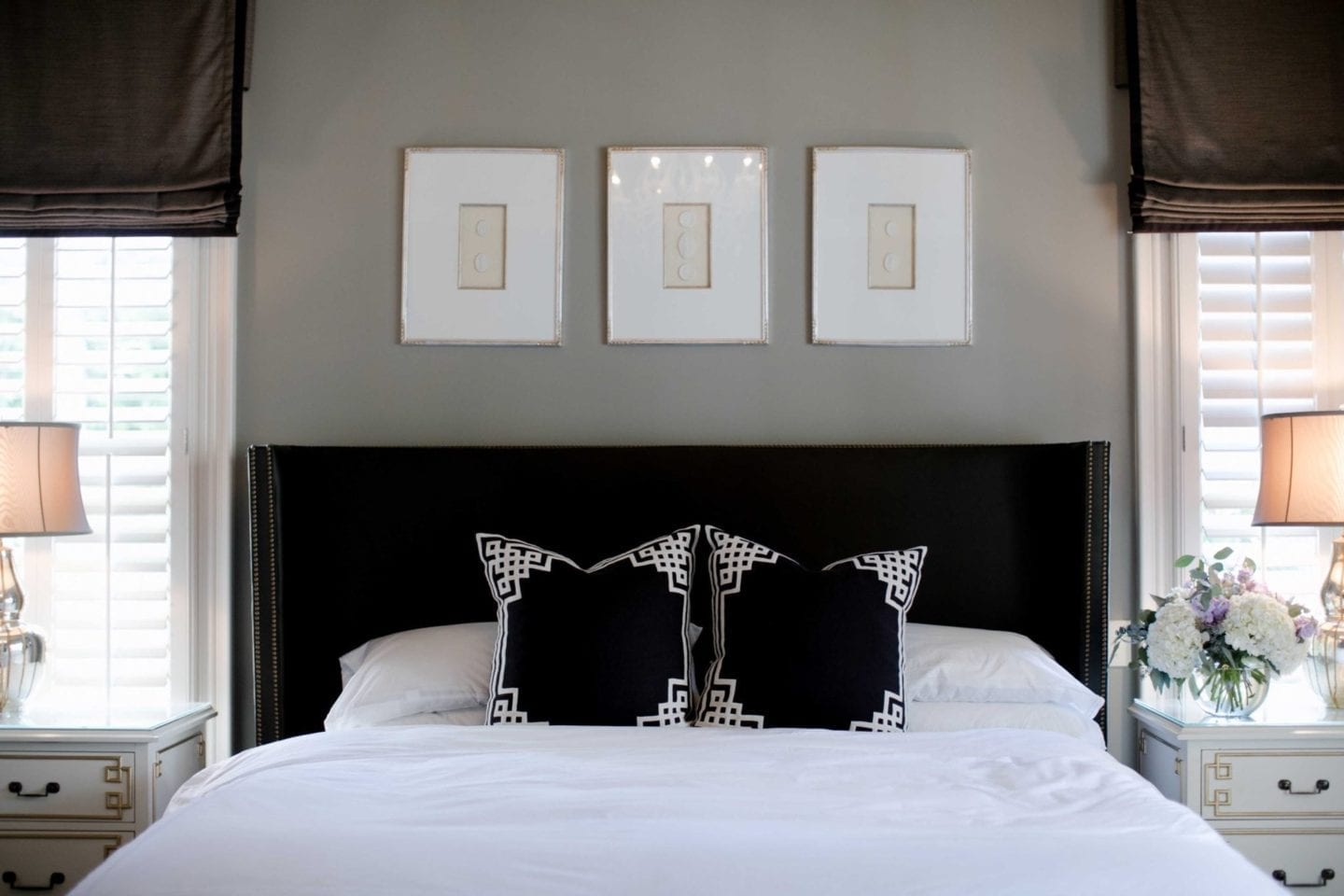 Dark master bedroom in gray and brown.
