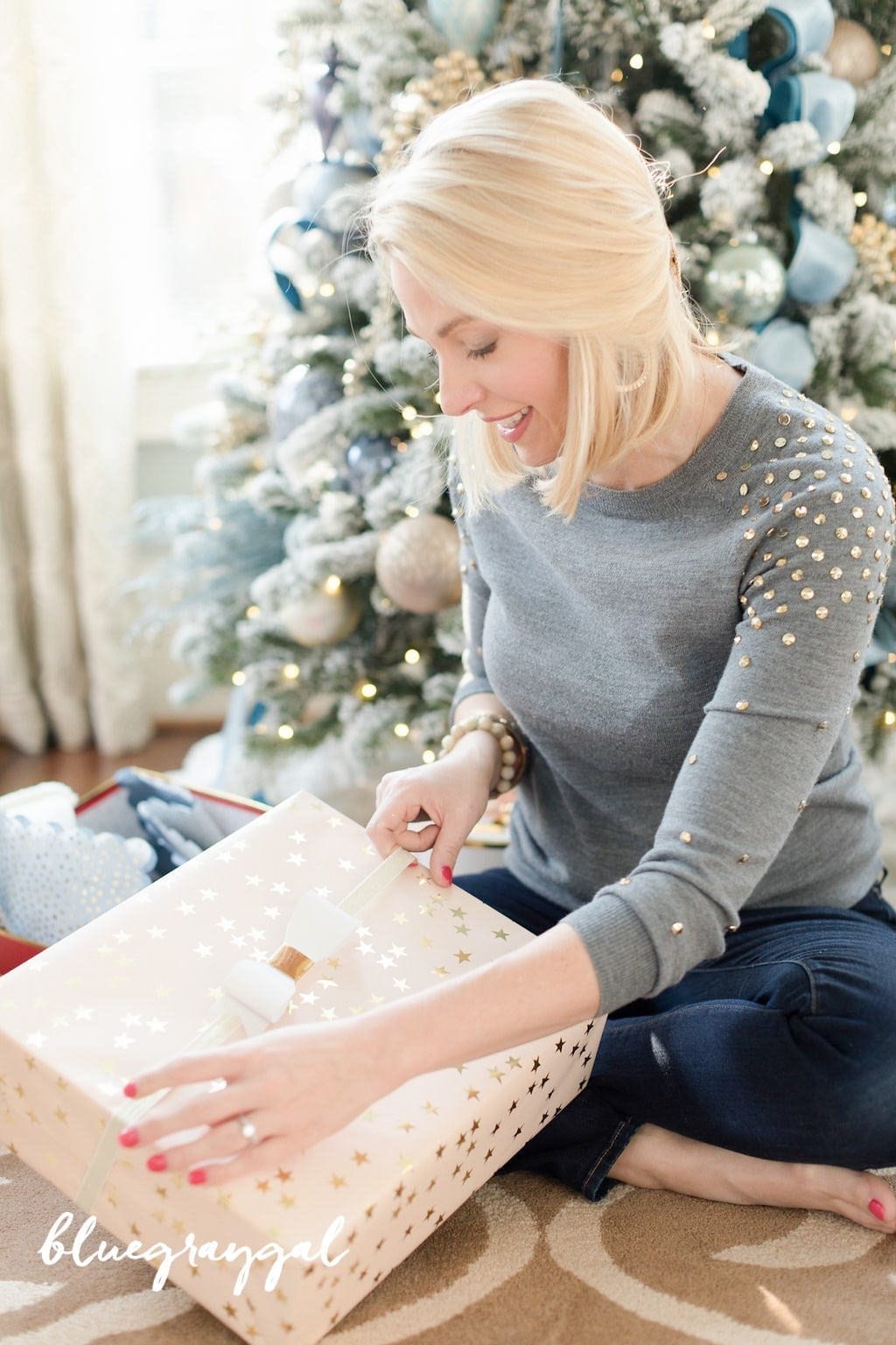 kelly page wrapping a paper with sugar paper for target