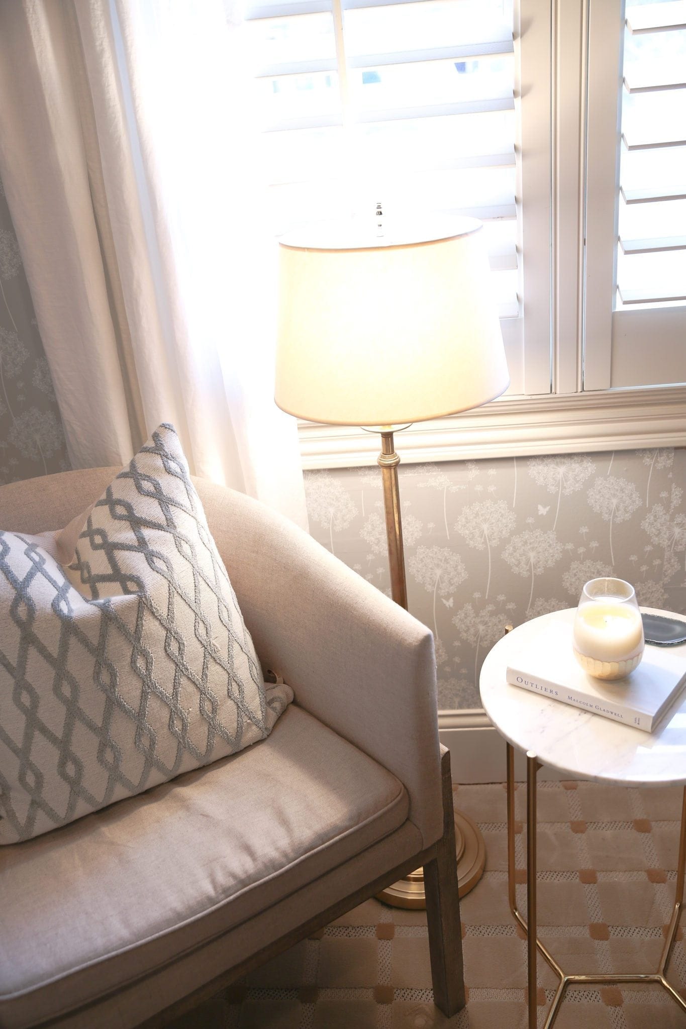 Decorating on a budget. Neutral gray and white linen drapes in home office.