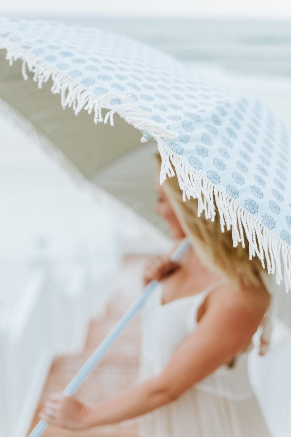 Blue fringe umbrella. Turning 40 and being a lifestyle blogger.