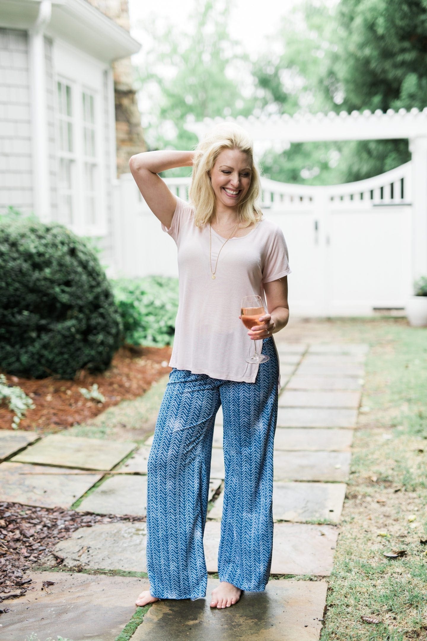 Summer outfit ideas for women with blue wide leg pants.