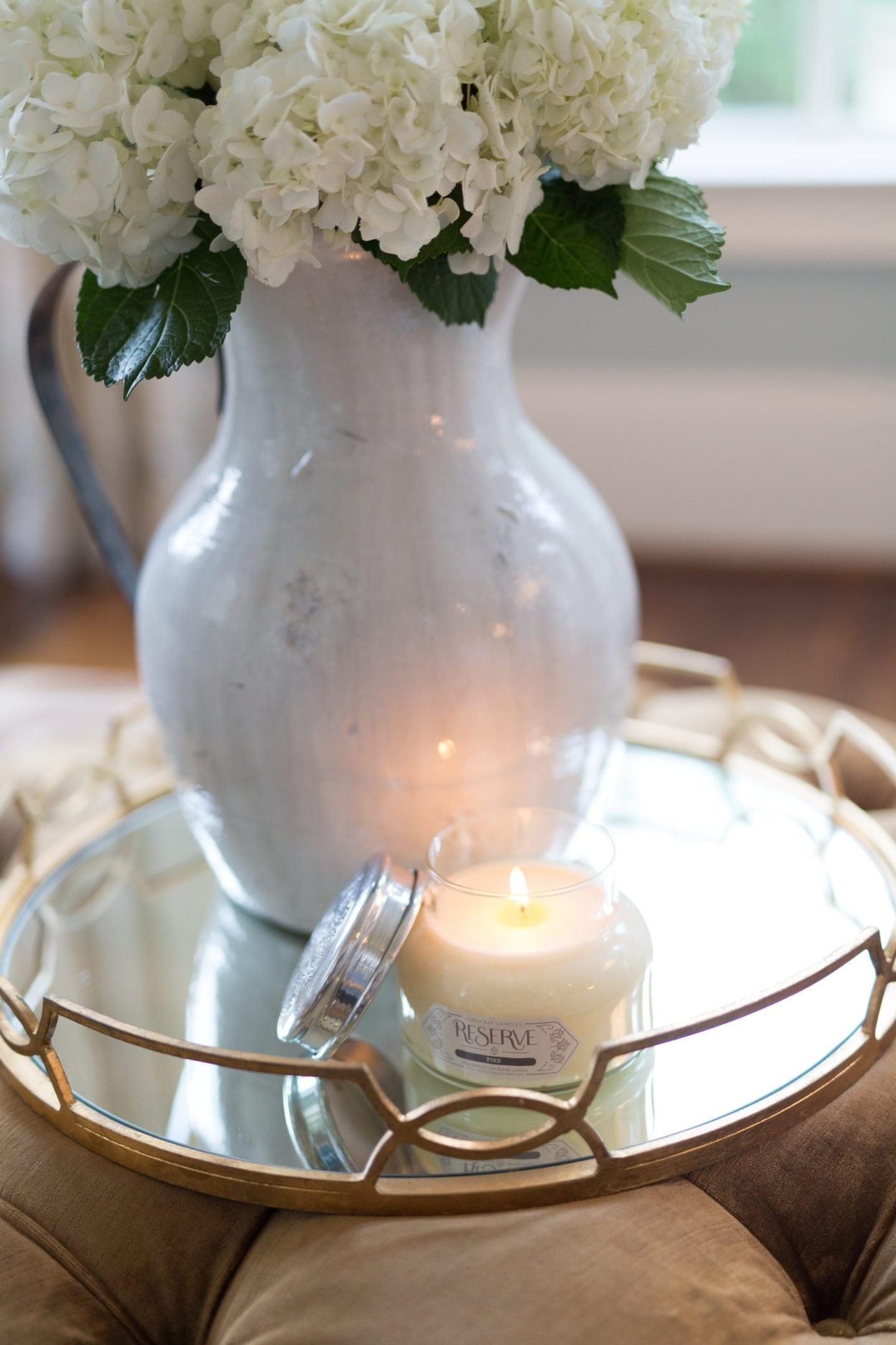 This Aspen Bay Candle is in the Reserve Fire scent. It is such a strong smelling candle! I have very high living room ceilings and the smell fills the entire sun room with a strong but beautiful fragrance. I use this candle on the weekends to make my home smell fresh and feel welcoming. 