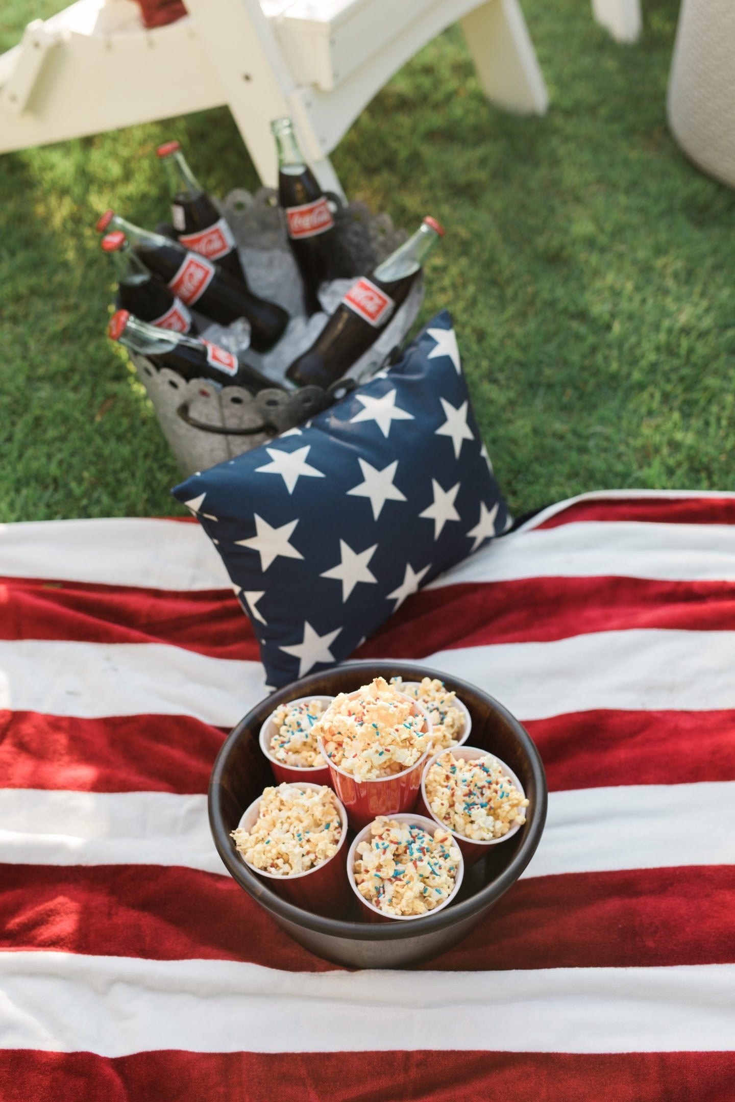Fourth of July tablescape and 4th of july party ideas with red white and blue party decor.