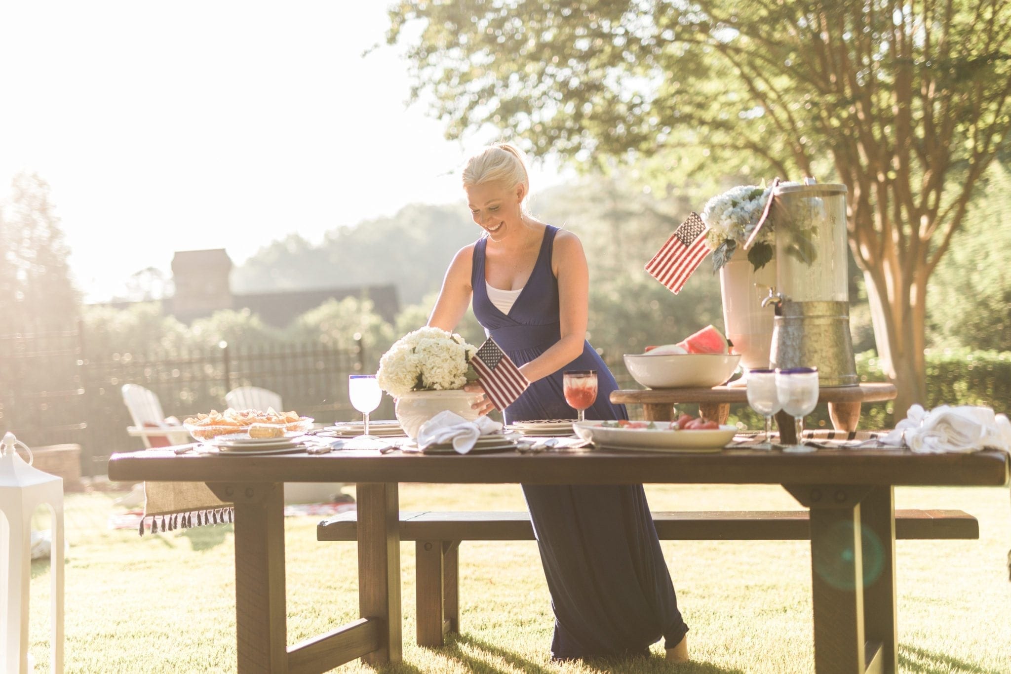 Get table centerpieces for party inspiration like this fourth of july decor with red white and blue table settings