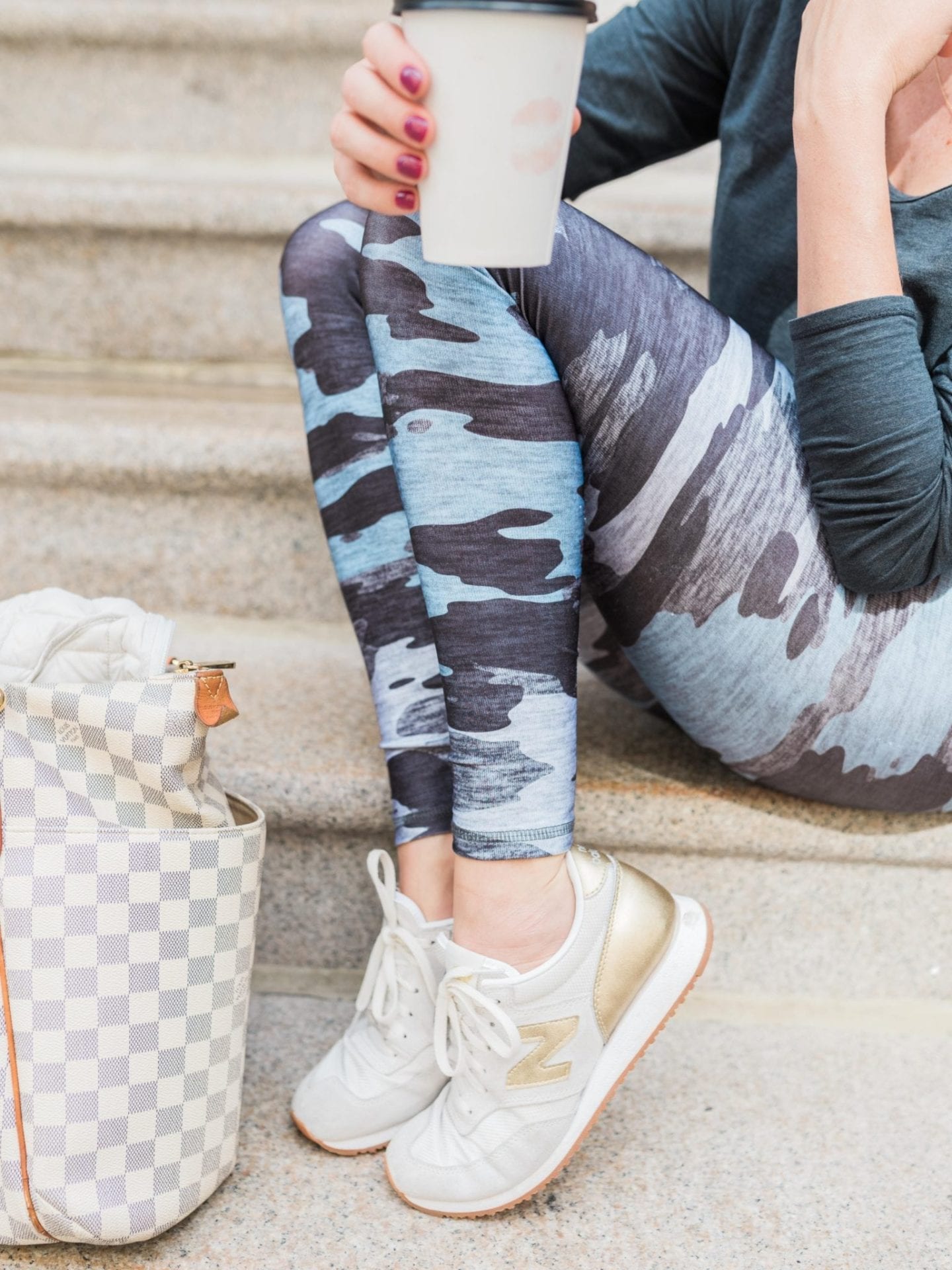 New Balance White and Gold Sneakers and blue camouflage leggings.