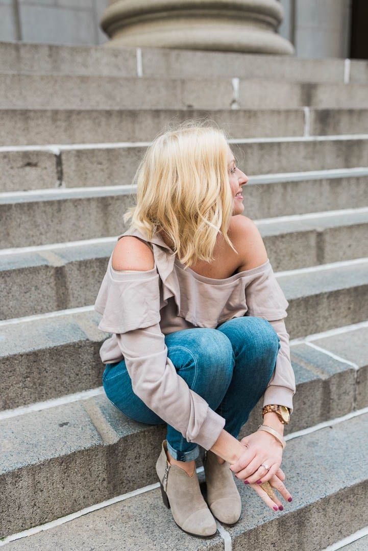 How to style booties with an off the shoulder slouchy sweatshirt.