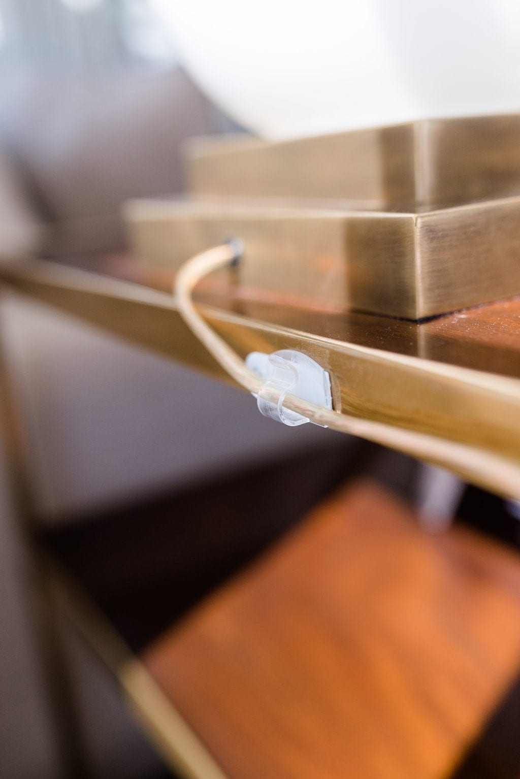 Easy tips to hide cords in your house and keep cords out of view when decorating.