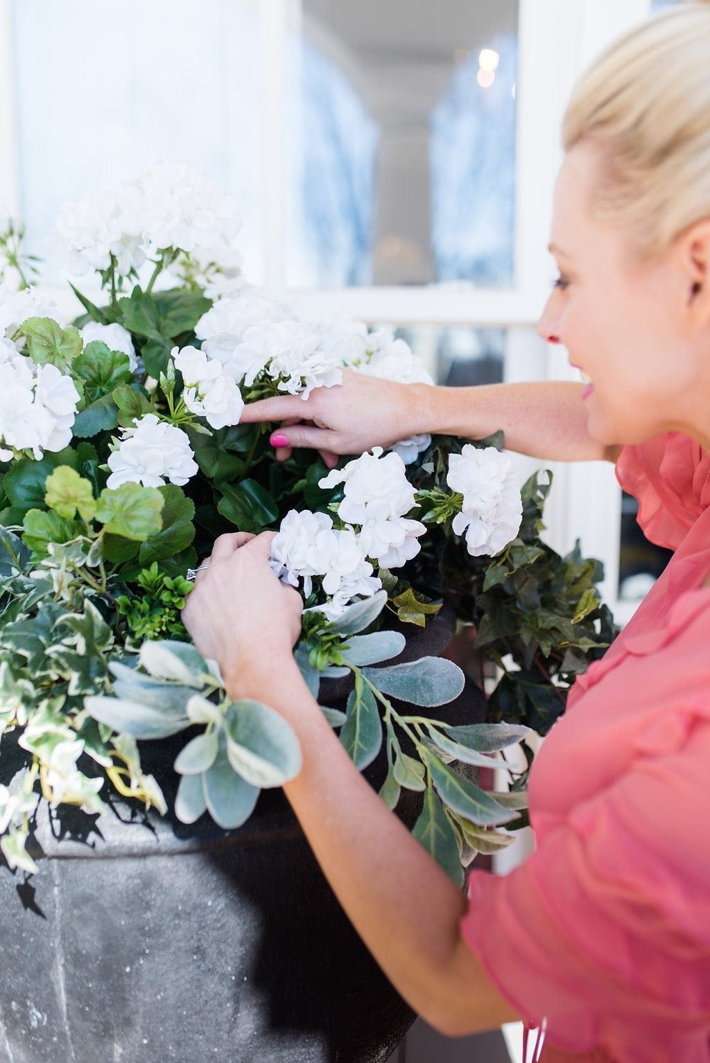 Want to learn how to arrange silk flowers so they look natural? Get tips for how to plant plastic plants outside to look real!