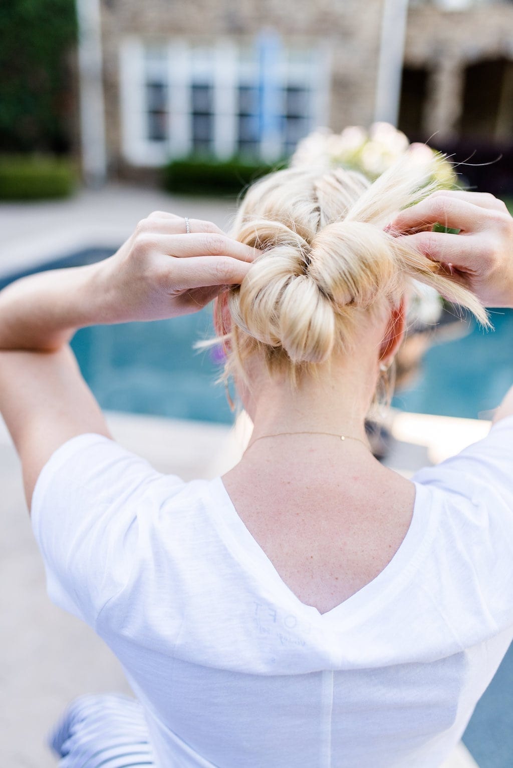 Low Bun hairstyle with braids.
