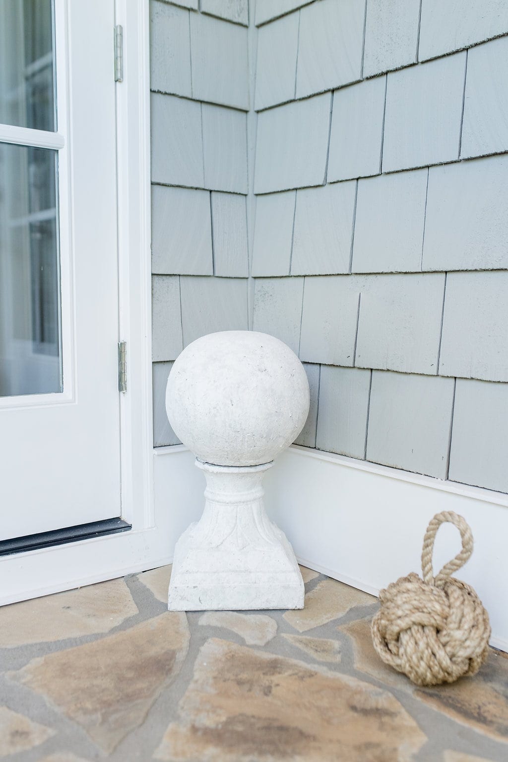 Knot door stopper and white ceramic finial.