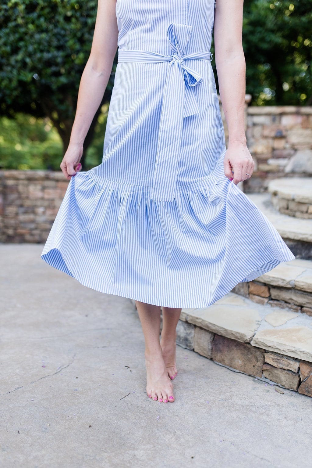 Seersucker dress with ruffle skirt detail.