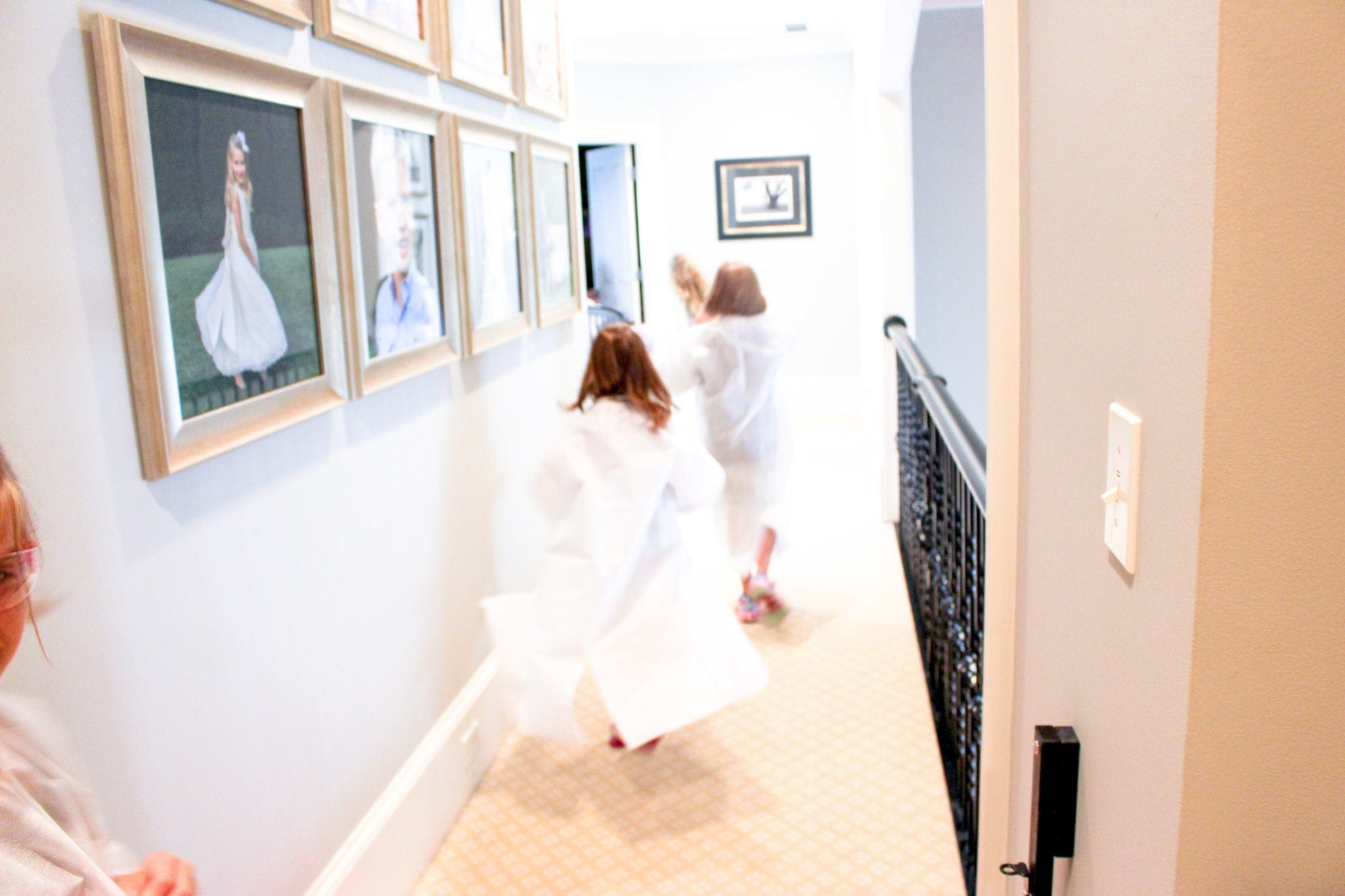 Science is fun! Kids running in throwaway lab coats.