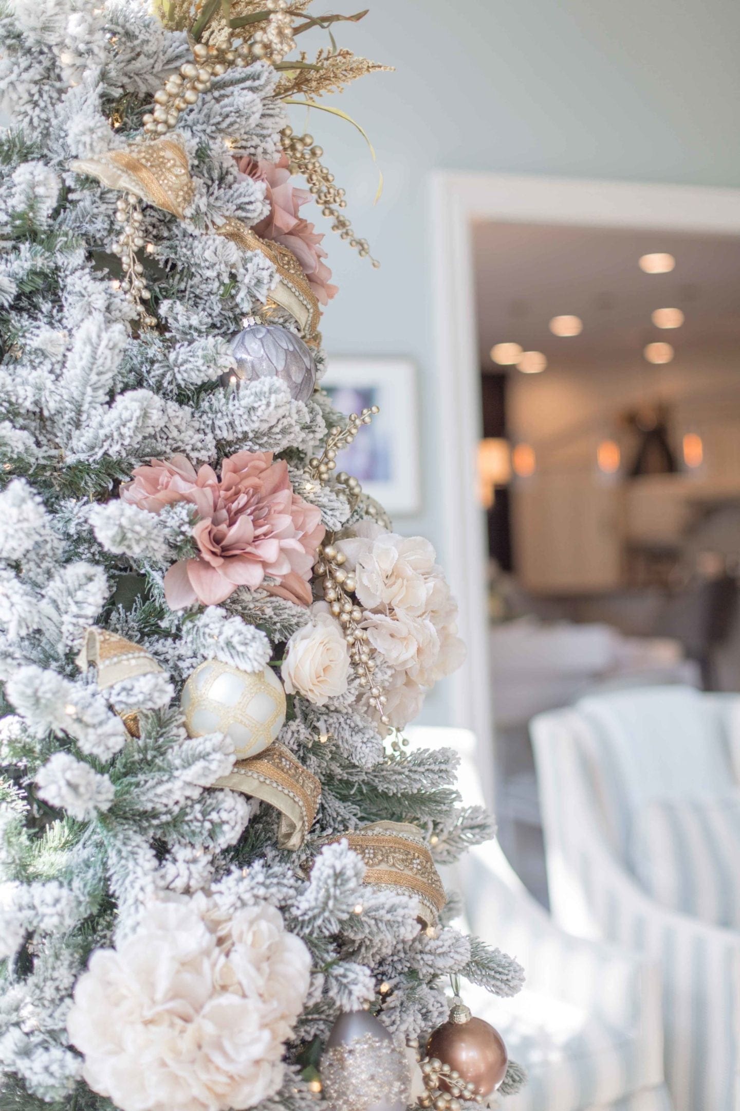 Fake hydrangeas on a Christmas Tree. A beautiful tree decorated in shades of blush pink with Frontgate ornaments and flowers from AFloral.com