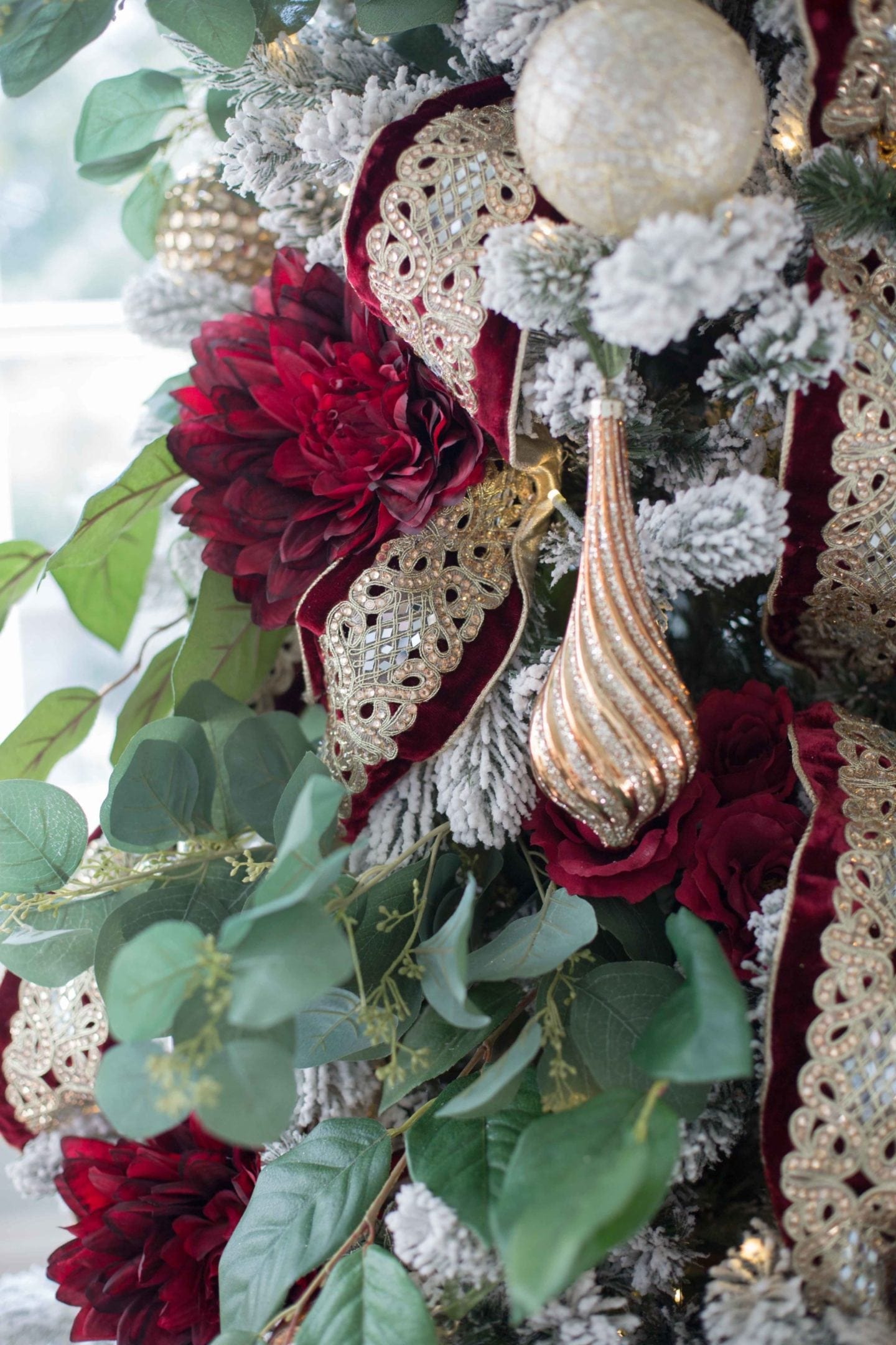 Red Christmas Tree using Christmas Tree flowers in deep red and green.