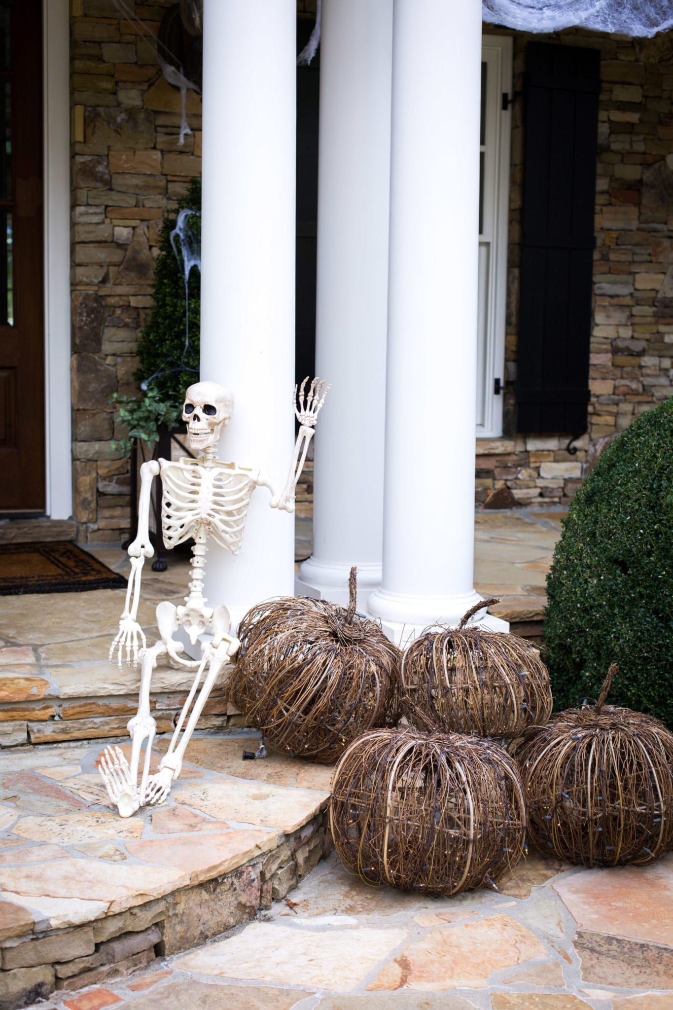 Decorating outside your house for Halloween.