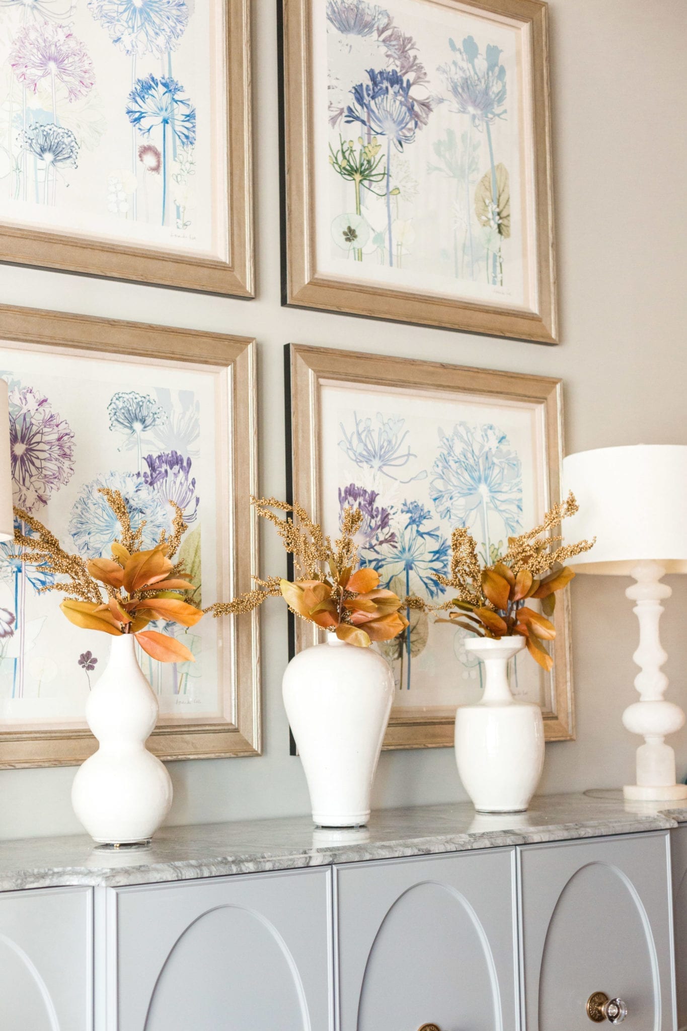 White Frontgate Vases with brown fall leaves.