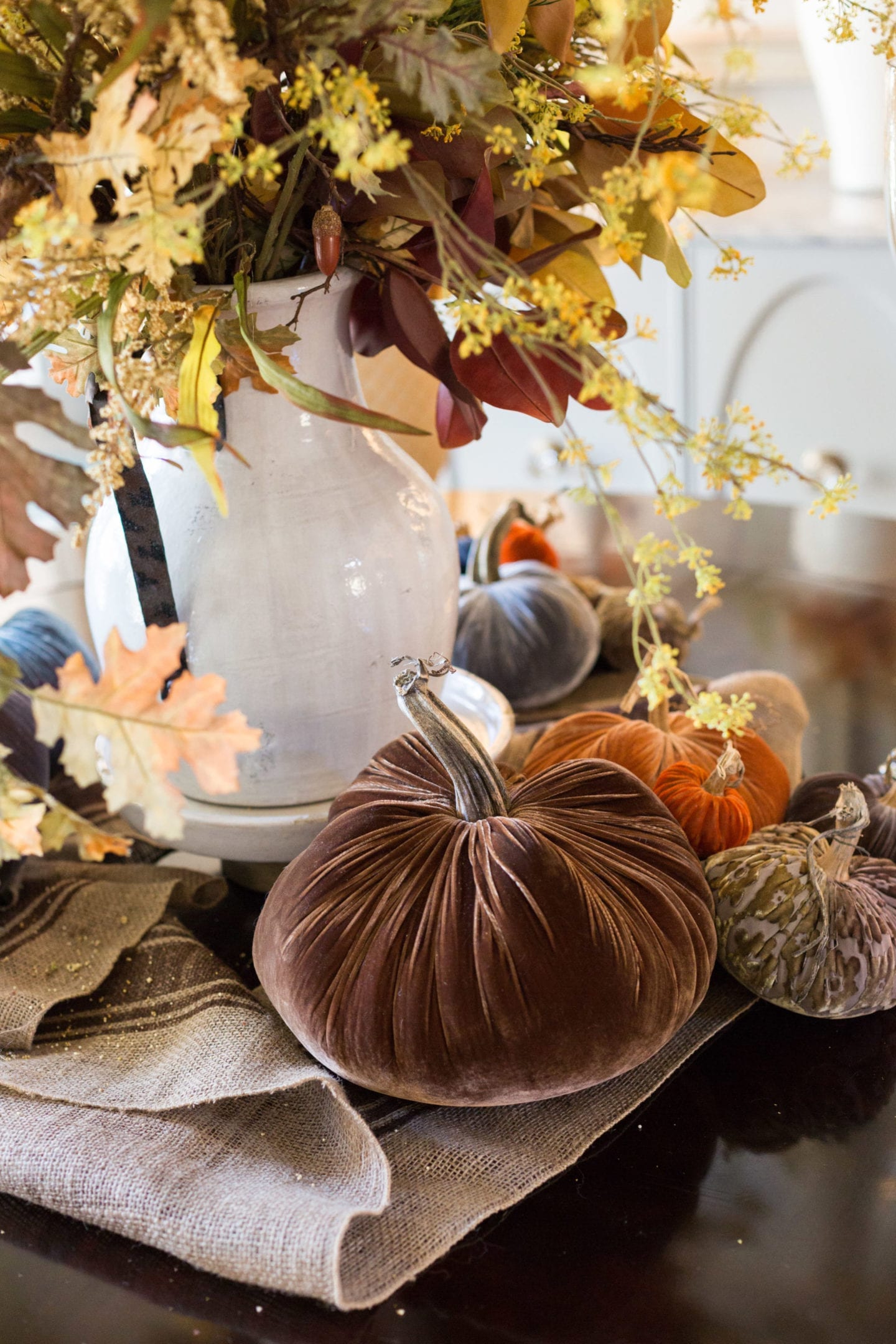 Fall velvet pumpkins. A beautiful farmhouse style table setting for fall centerpieces for dining room table.
