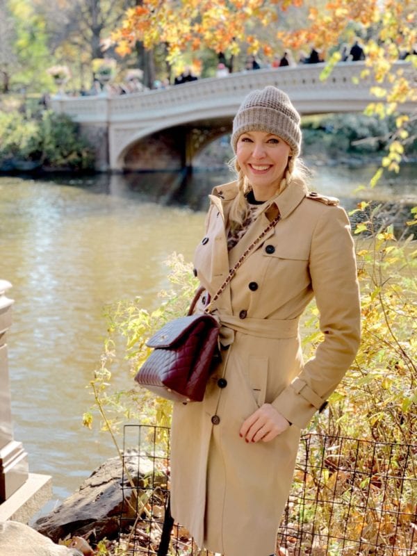 Burberry Trench Coat and Burgundy Chanel bag.
