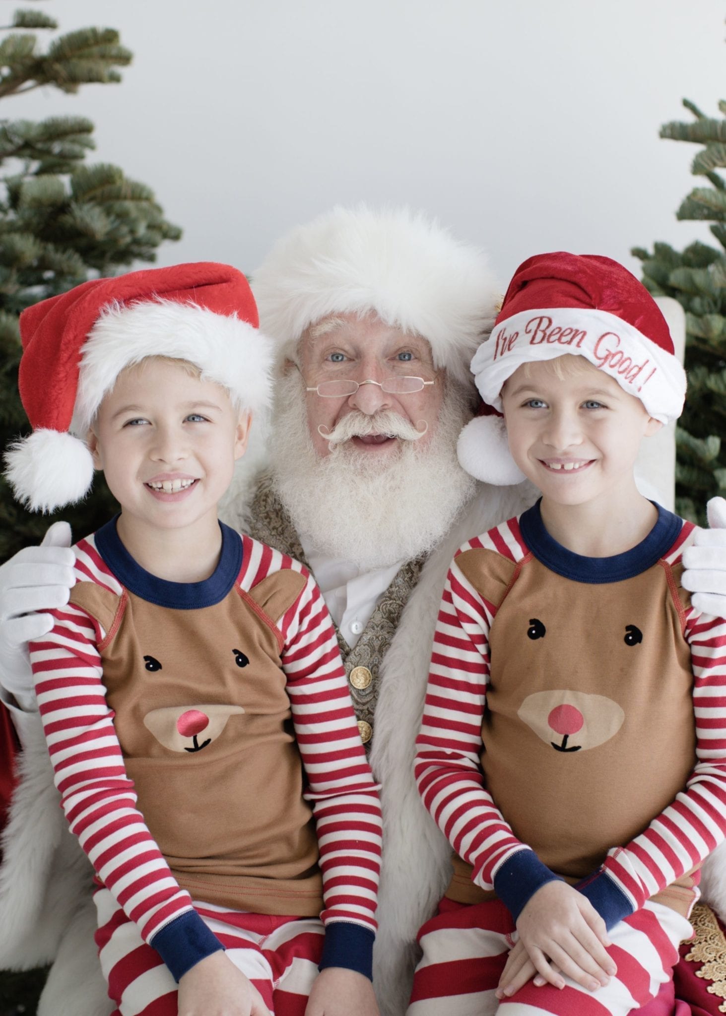 Identical twin boys in Hanna Andersson Christmas Pajamas