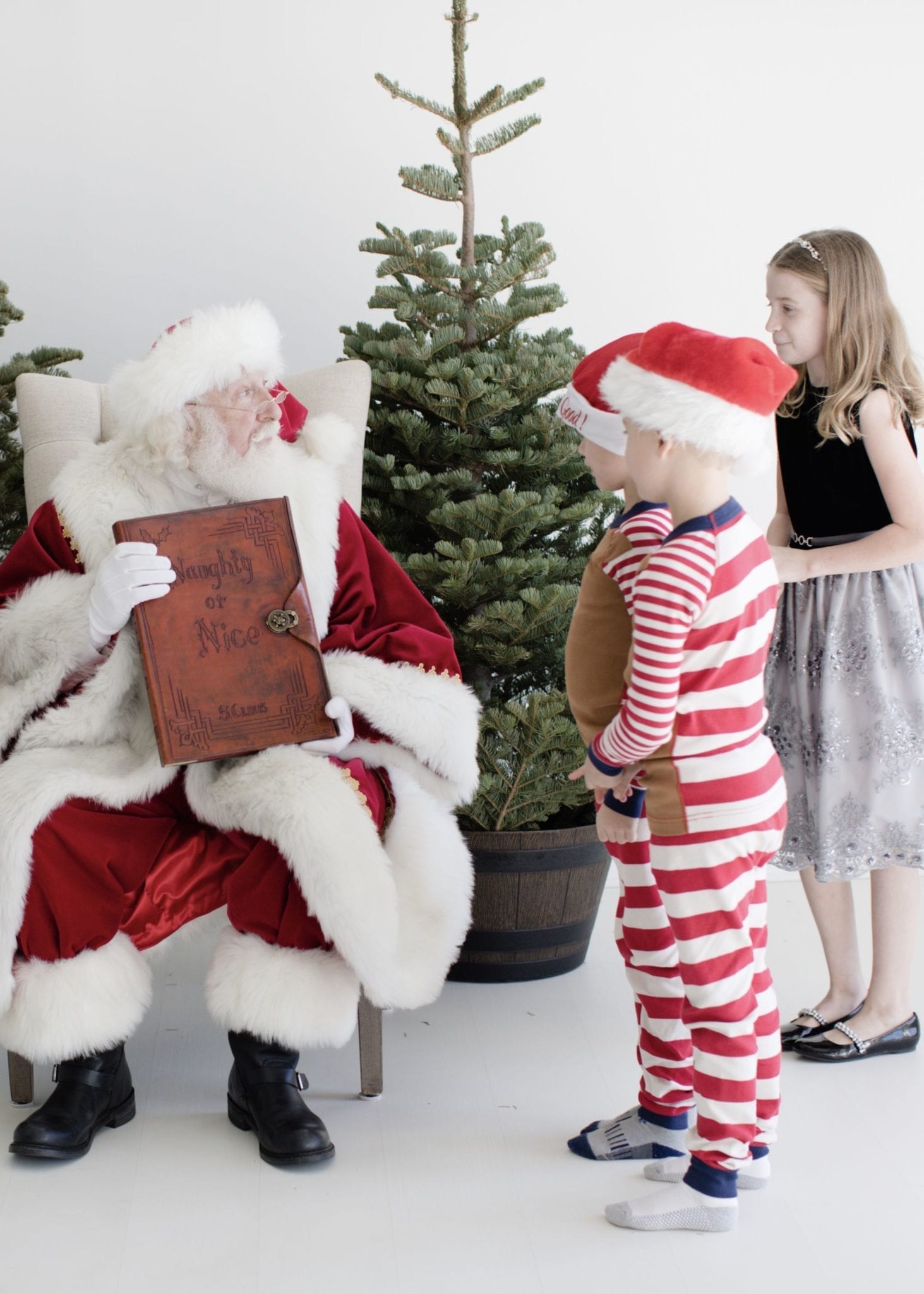 hanna andersson christmas Pjs and Monsoon Atlanta girls formal dress for pictures with Santa.
