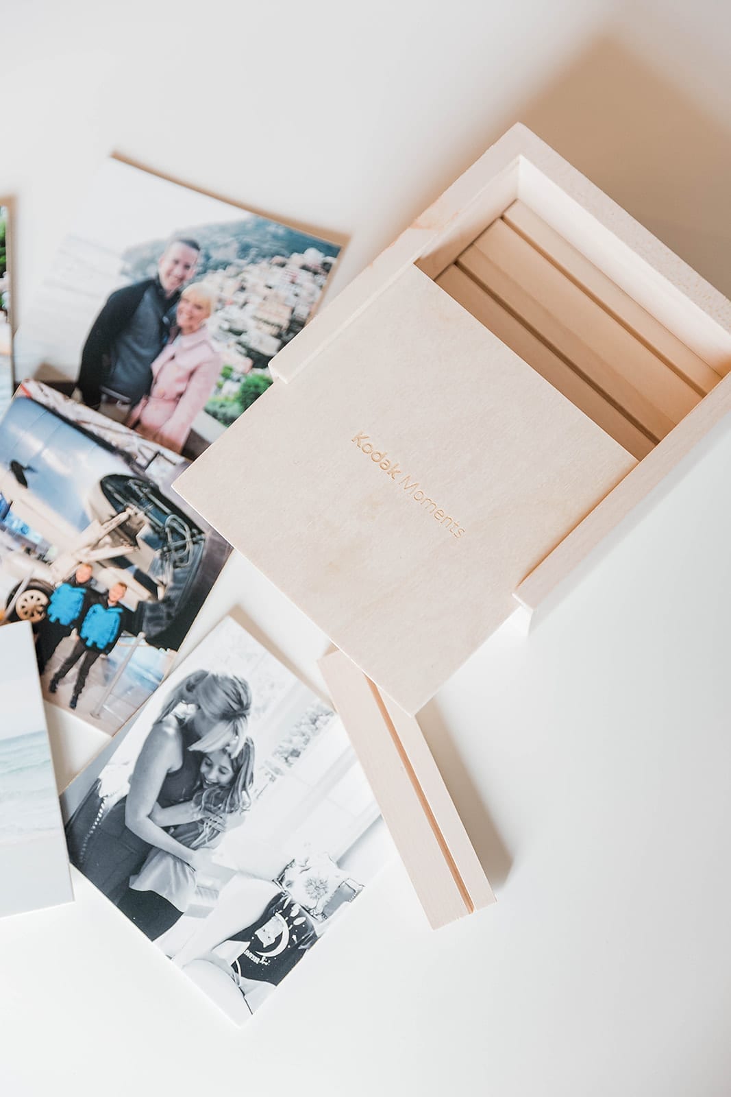 Looking for creative photo display ideas? This box is the bomb! Print ten photos once and change them all year to display!