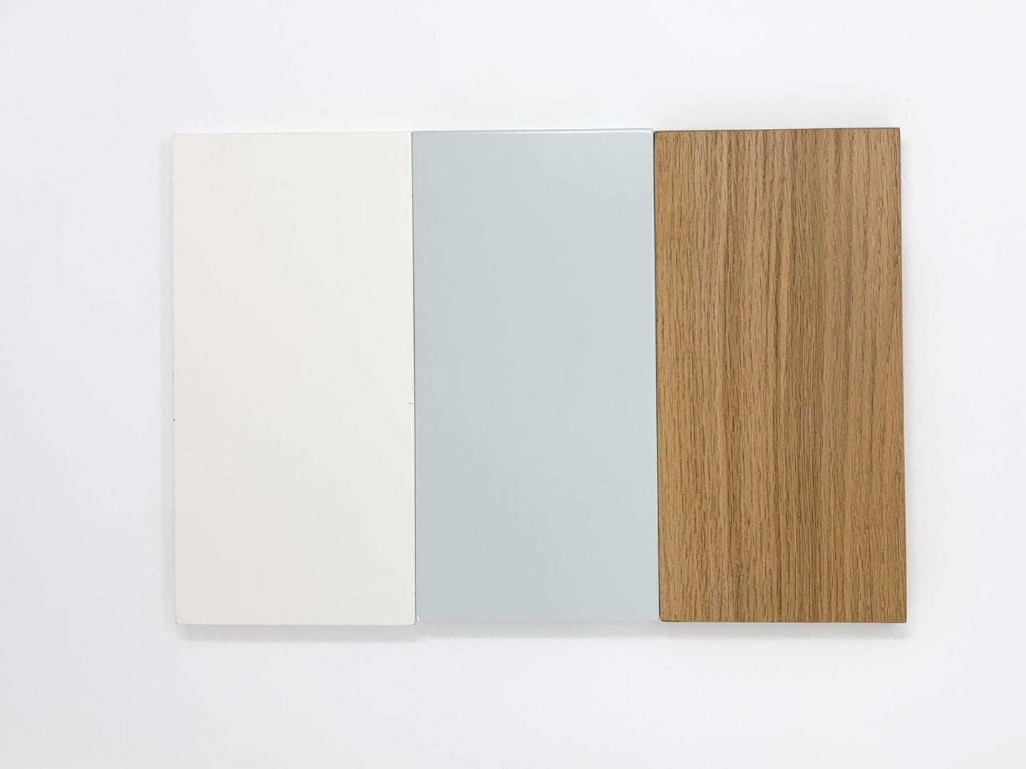 Skylight paint for cabinetry mixed with White Dove painted cabinets and warm wood for kitchen remodel.