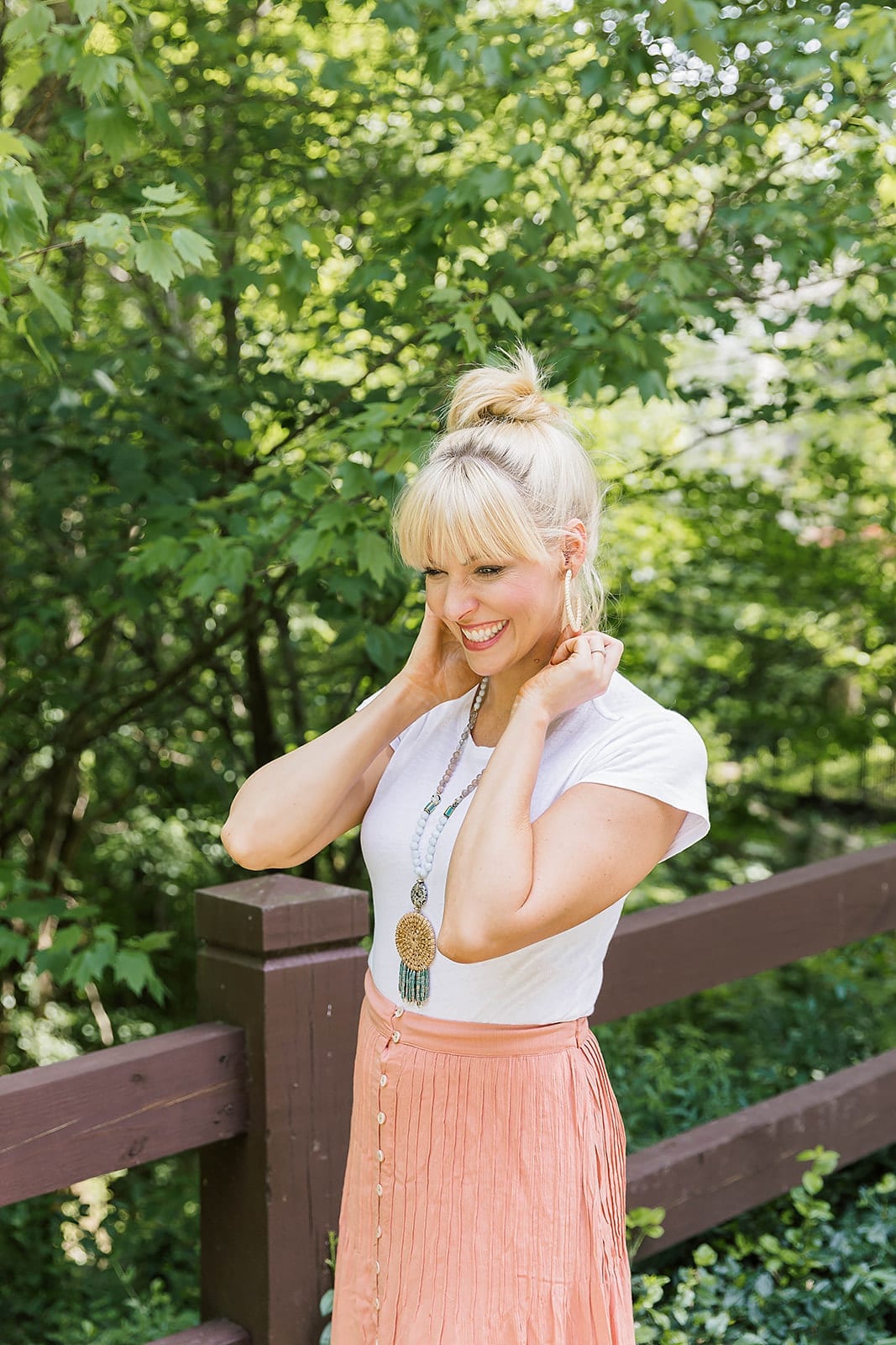 Top Knot with Bangs hairstyle.