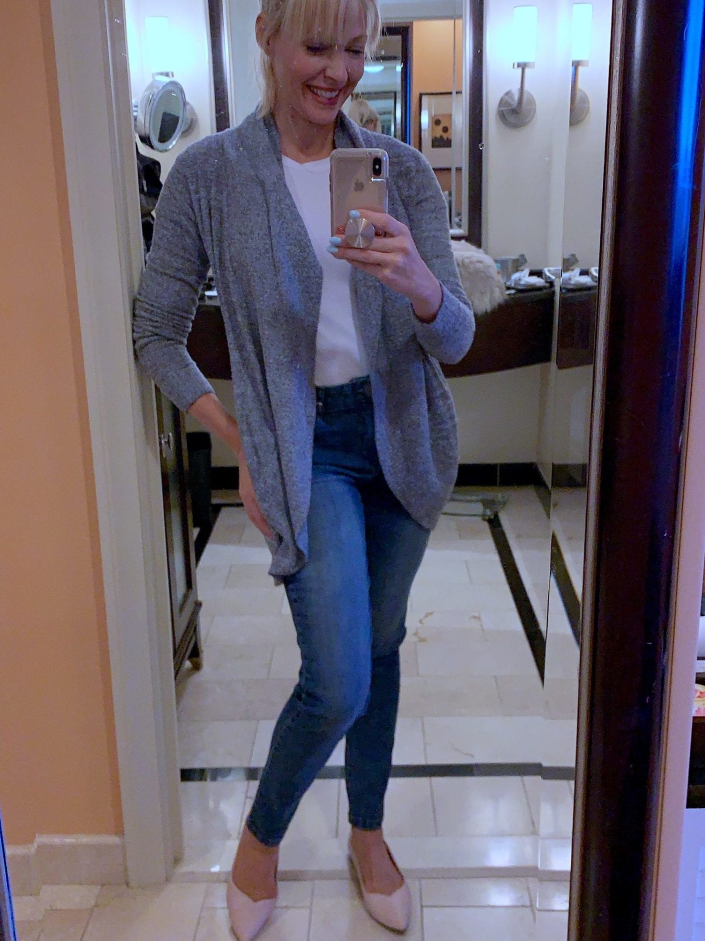 Barefoot Dreams Circle Cardigan with jeans and pink ballet flats.