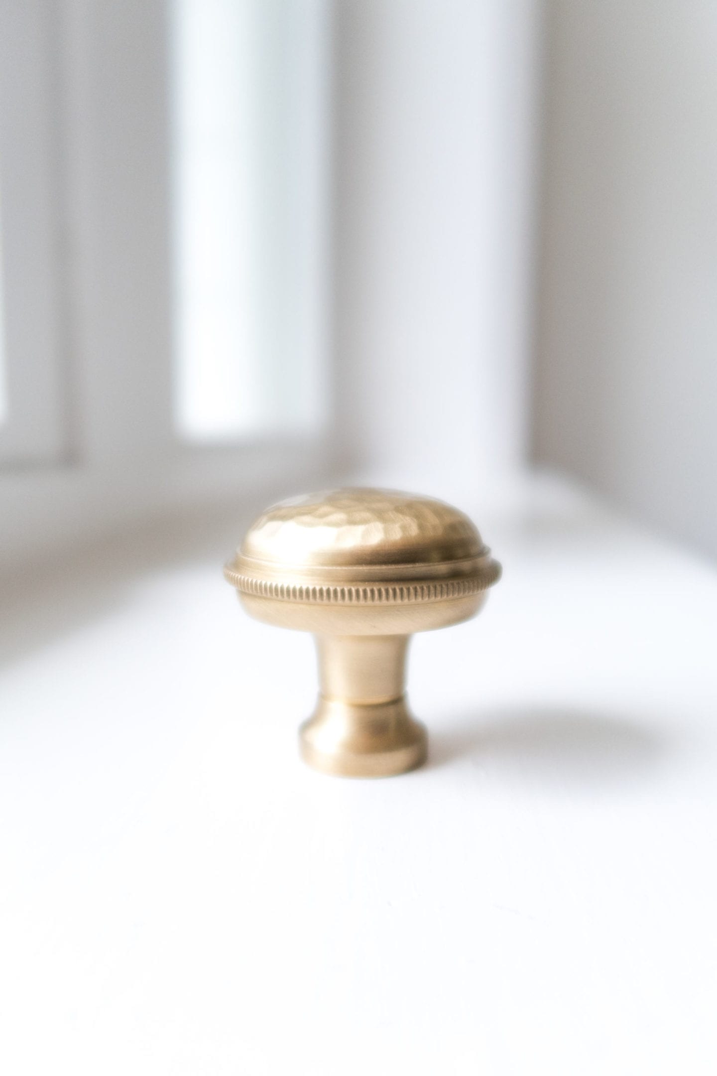 Cabinet Knob with hammered top for cabinet redesign.