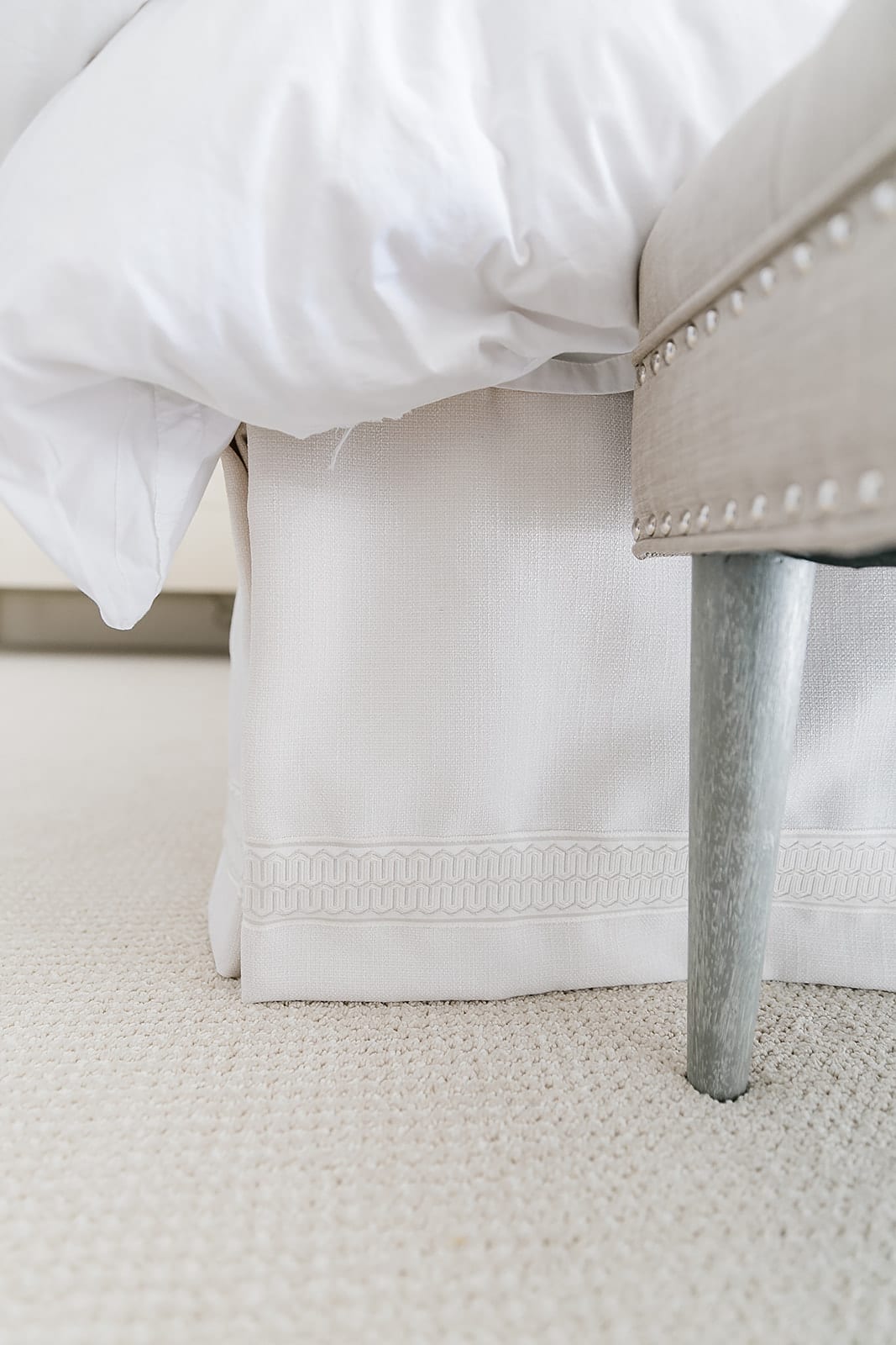 Ivory Bedskirt. Custom ivory skirt with trim from Calico Corners. Neutral bedroom decor.