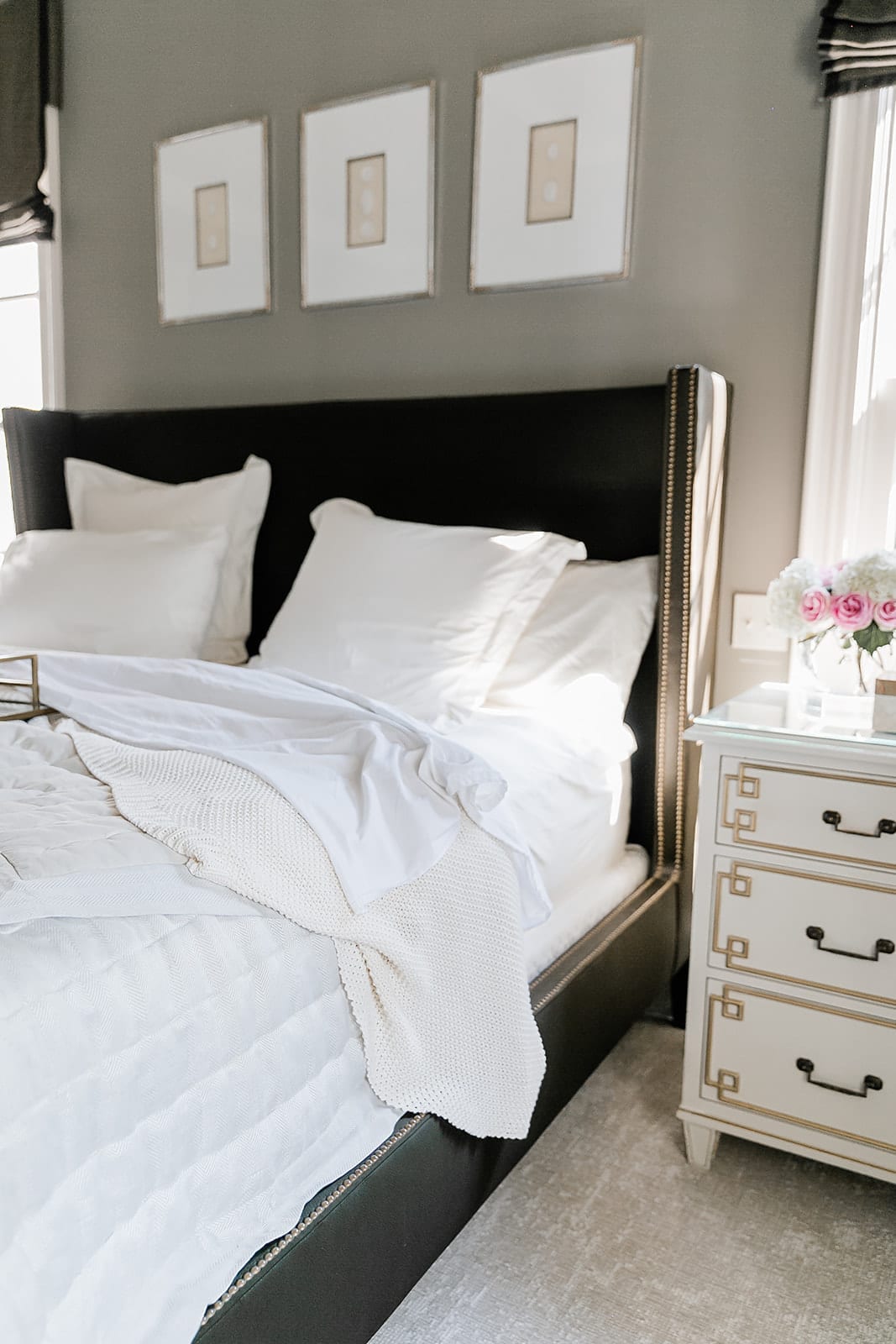 Pine Cone Hill Bedding. Master Bedroom linens in ivory. Brown silk headboard and gray walls.