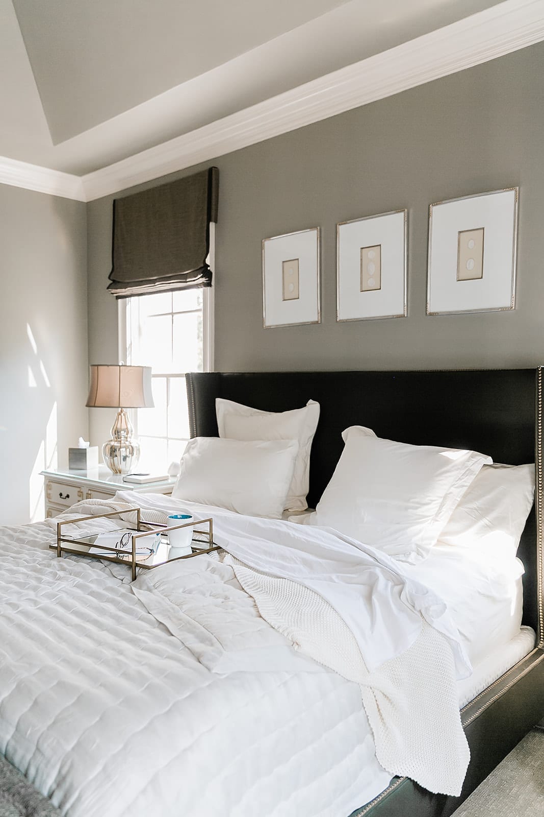 Brown and Gray Bedroom decor. Gray walls with brown bed and Annie Selkie linens. Ivory nightstand with gold metallic accents.