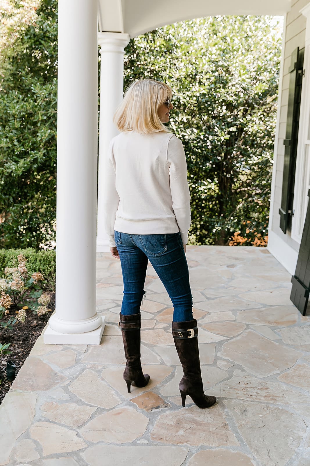 Brown Suede Knee High Boots with gold buckle.
