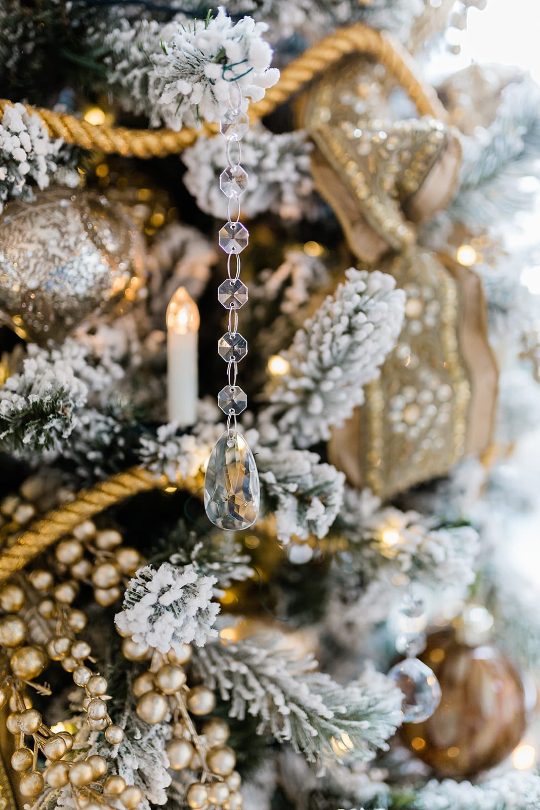 Gold Flocked Christmas Tree. How to decorate an elegant white and gold Christmas tree in gold with crystal.