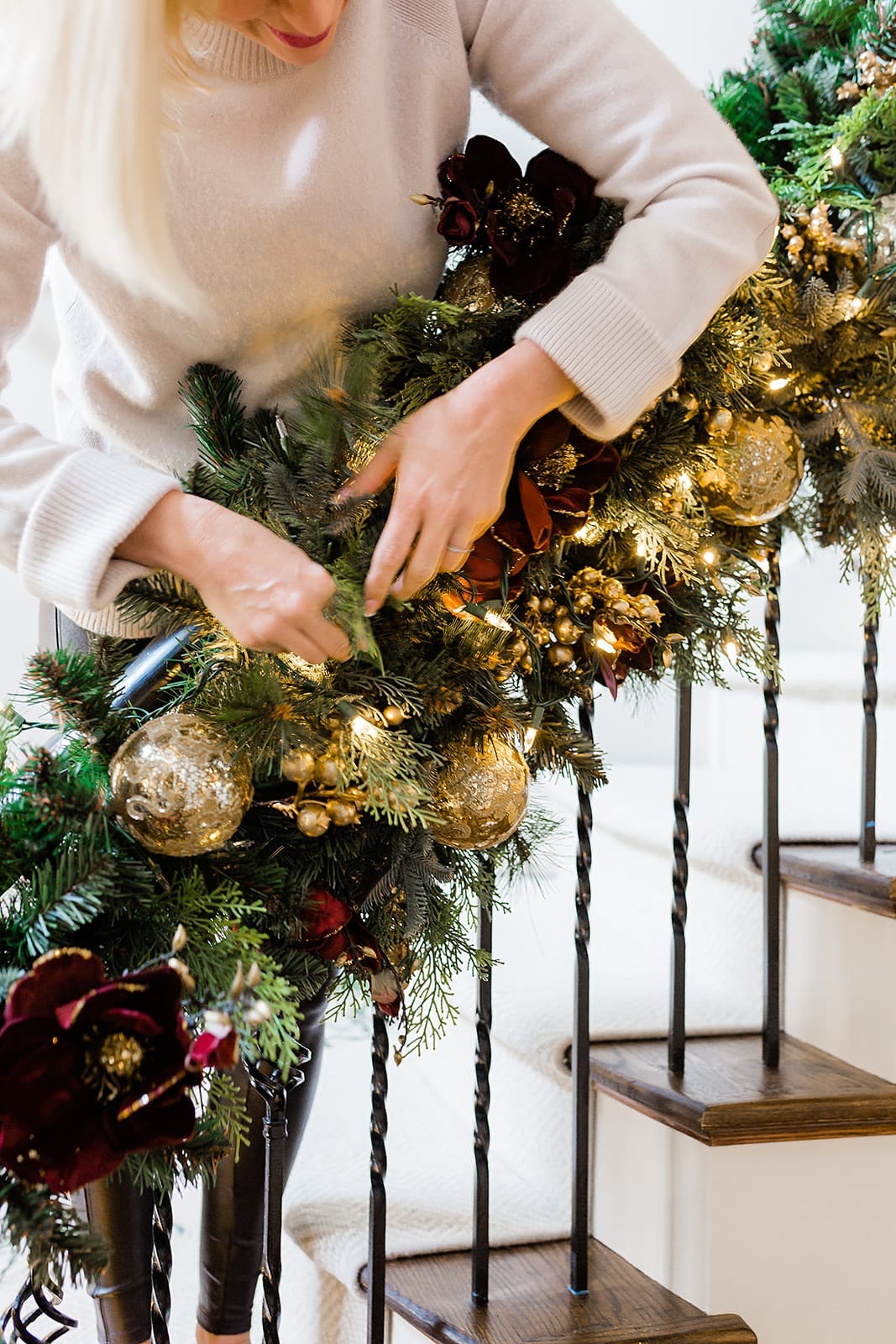 Hanging Garland on Staircase with blogger BlueGrayGal. Frontgate merlot and gold garland.