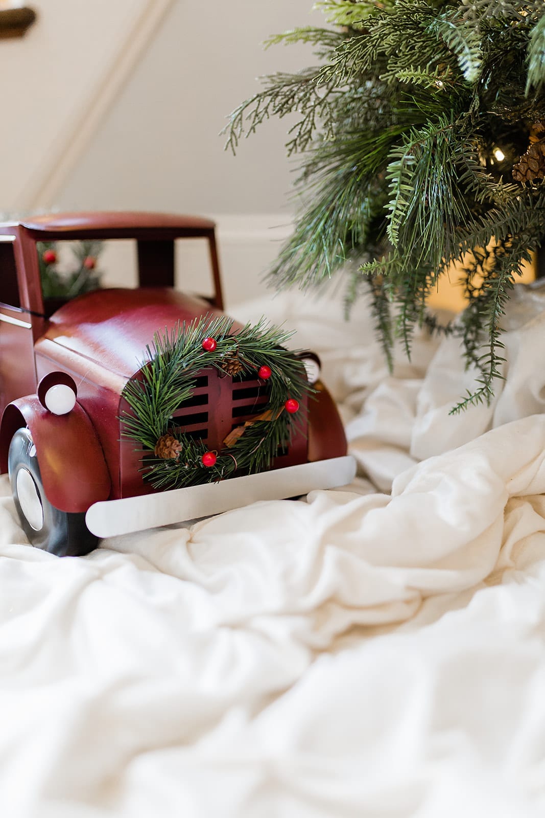 Red Christmas Truck with Ivory Christmas Tree Skirt. Christmas decor accessories.