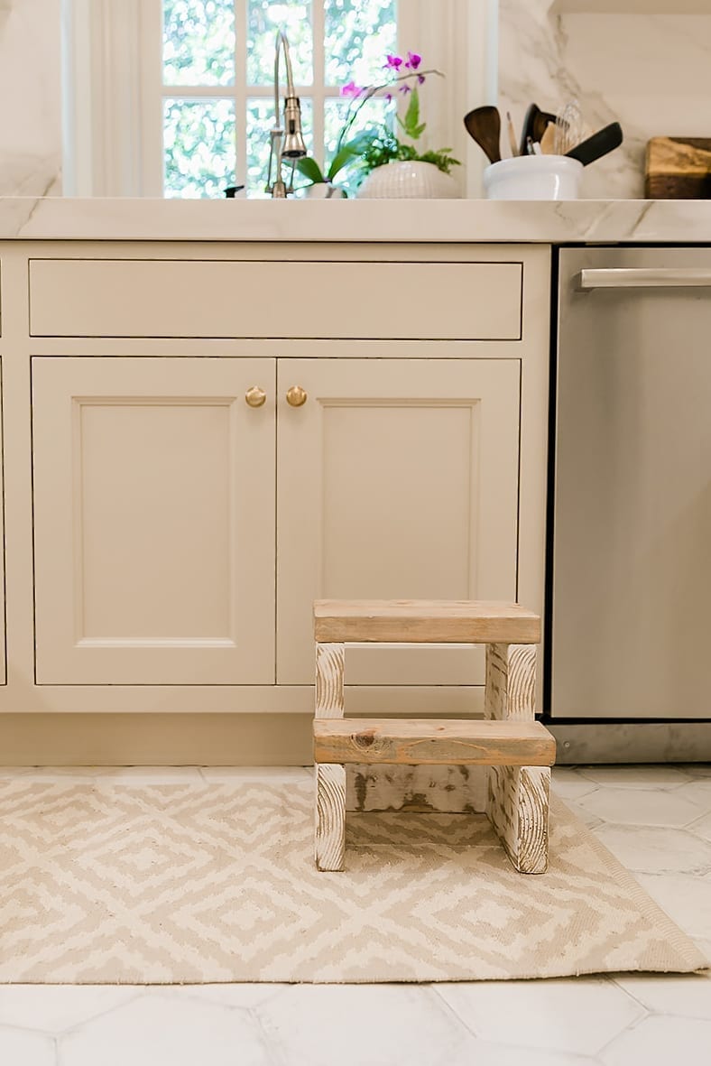 Farmhouse stool for kitchen. Dash and Albert rug and kitchen design ideas.