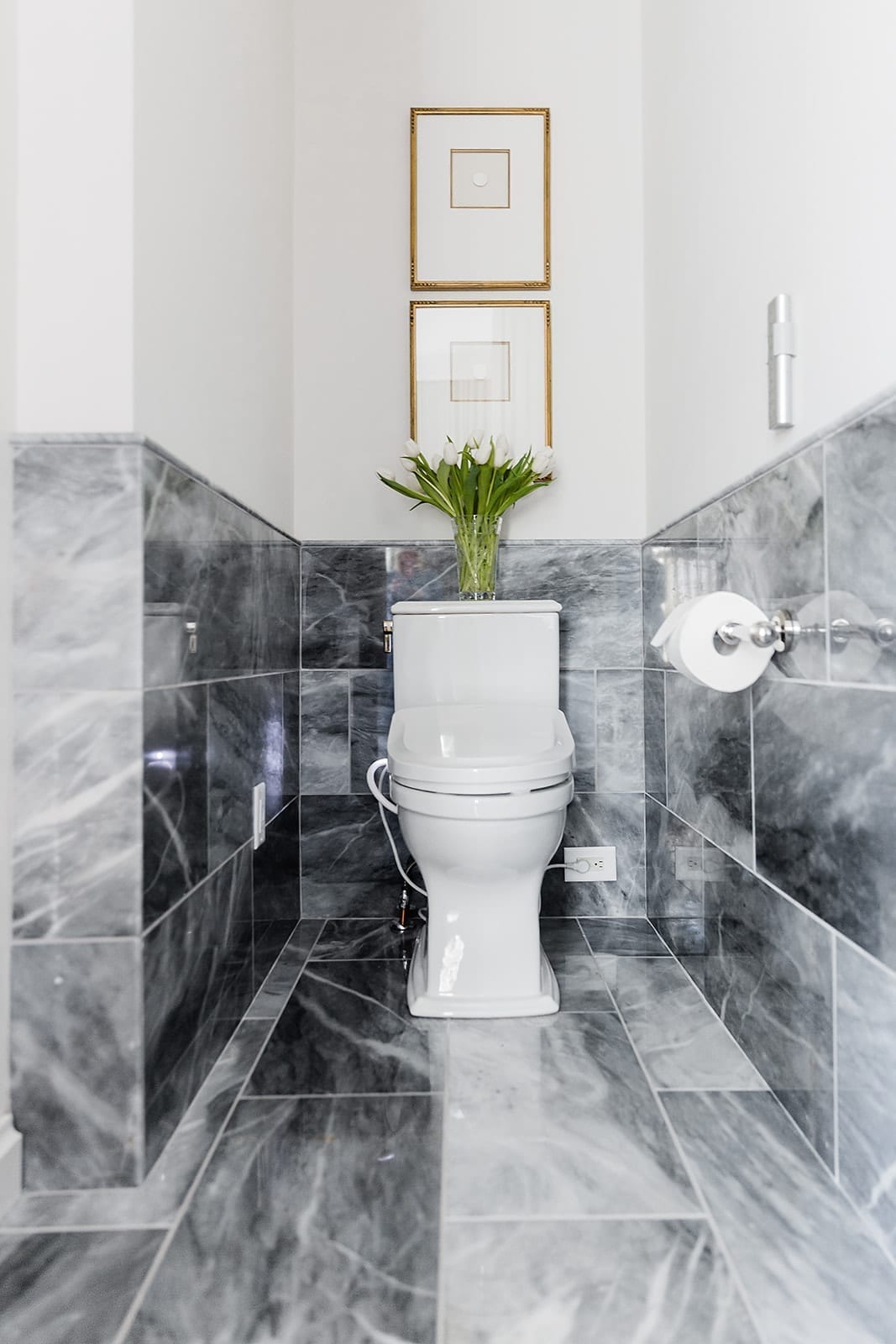 TOTO Toilet in master bathroom. Bardiglio marble floor and splash with Intaglio frames.