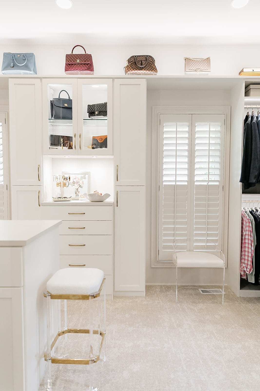 How to make your closet pretty. Display handbags in your closet with specialty closet lighting.