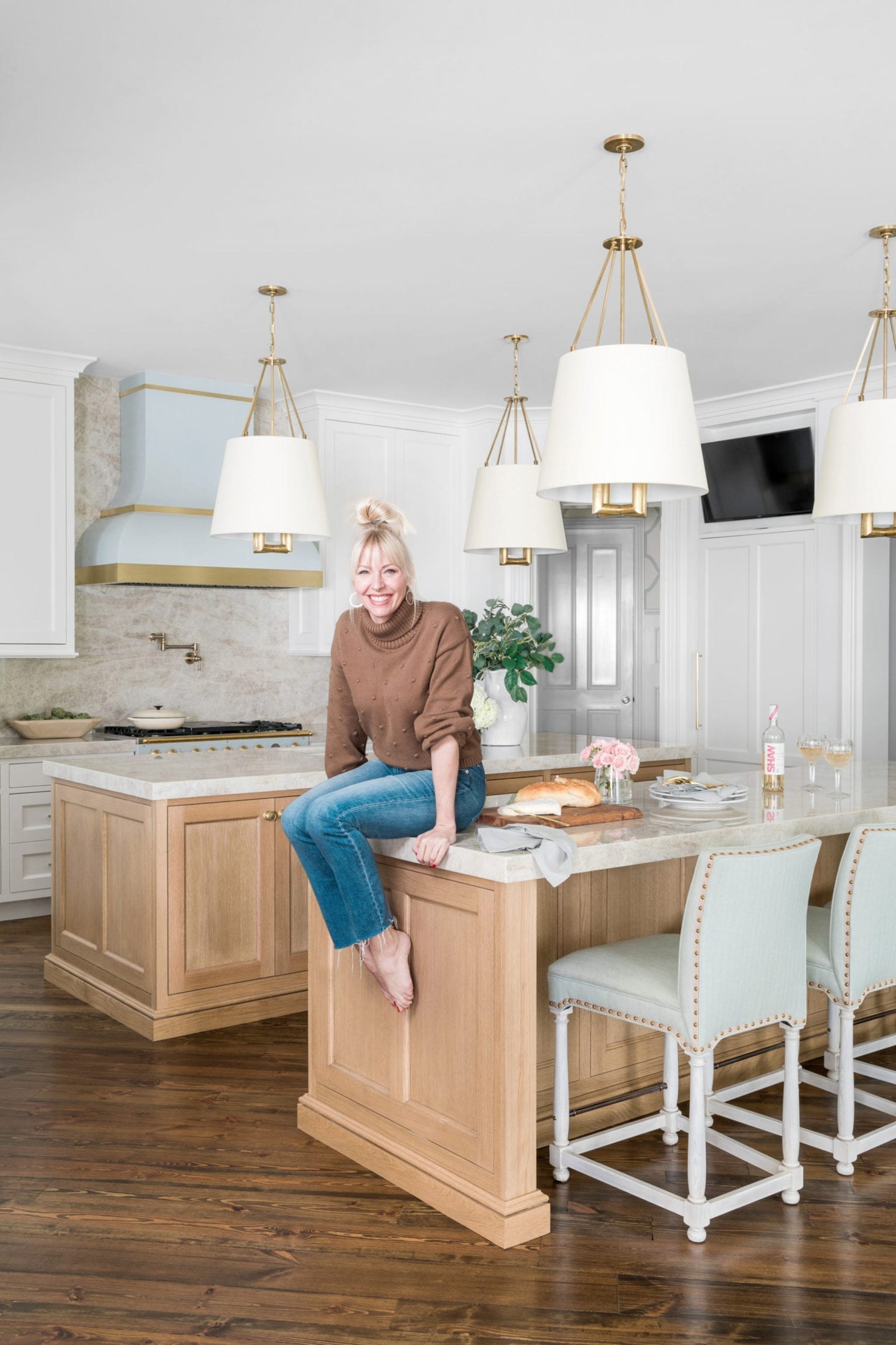 Atlanta home blogger BlueGrayGal, Kelly Page, in her newly remodeled kitchen with blue, wood and taupe decor.