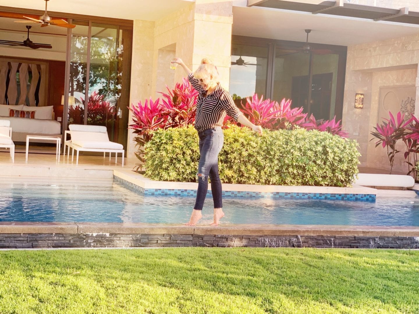 Kelly Page, BlueGrayGal, write a travel blog about my travels in 2020. Walking on an infinity edge pool at the Ritz Carlton Puerto Rico resort.