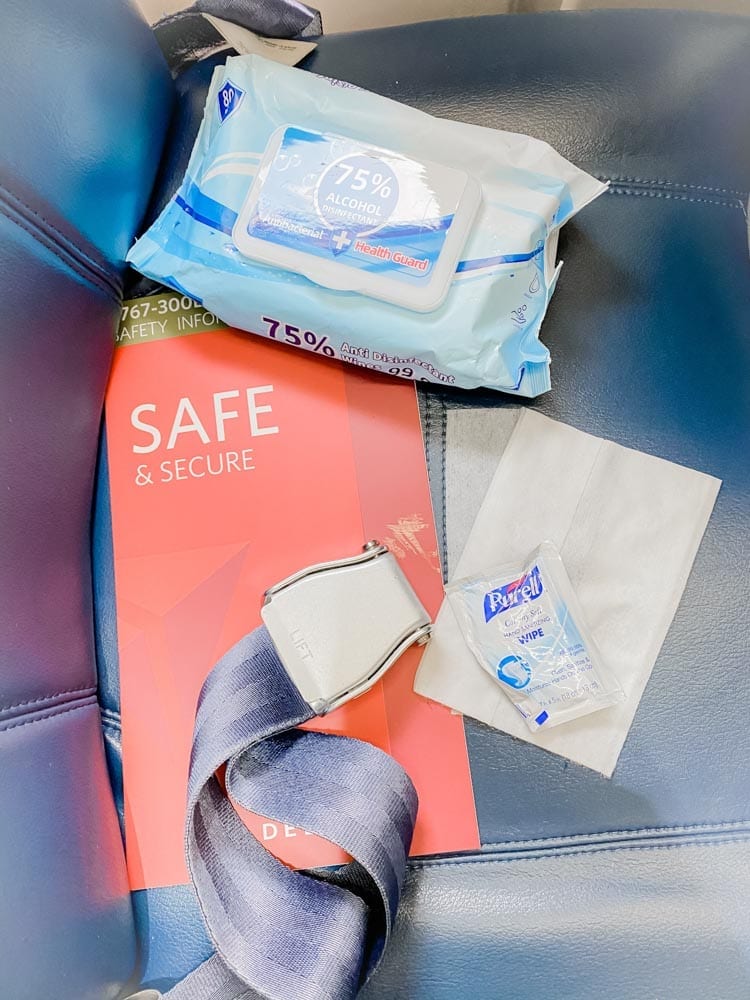 Tips & tricks to flying on Delta during COVID, including how to travel with kids safely during Coronavirus.