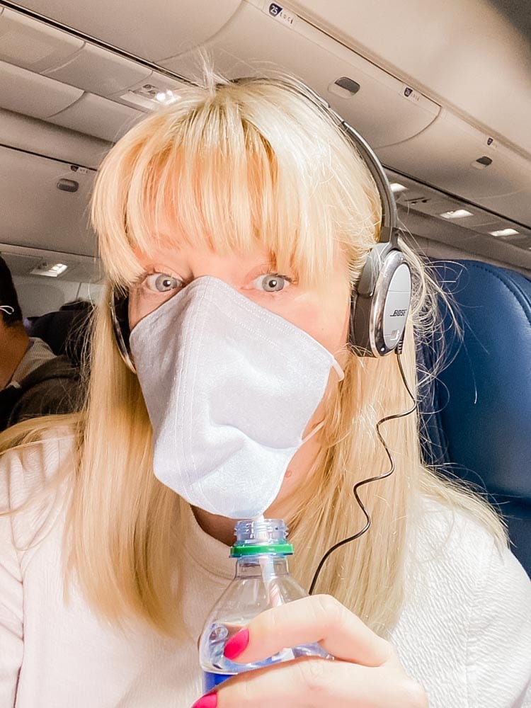 Tips & tricks to flying on Delta during COVID, including how to travel with kids safely during Coronavirus.