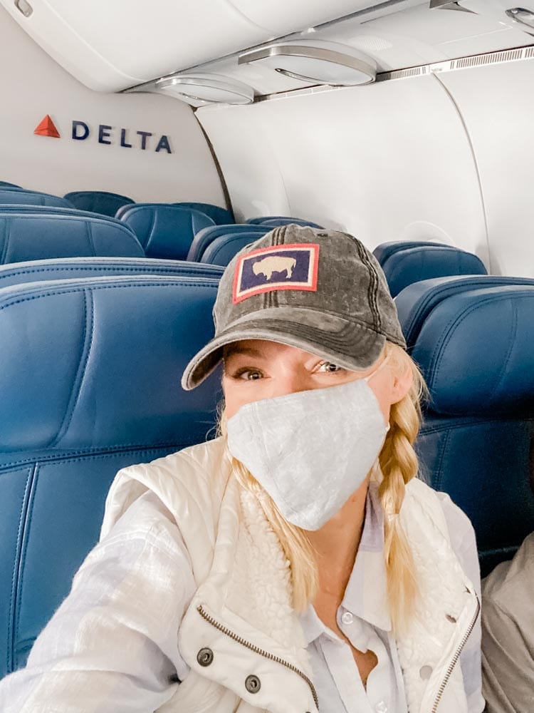 Tips & tricks to flying on Delta during COVID, including how to travel with kids safely during Coronavirus.