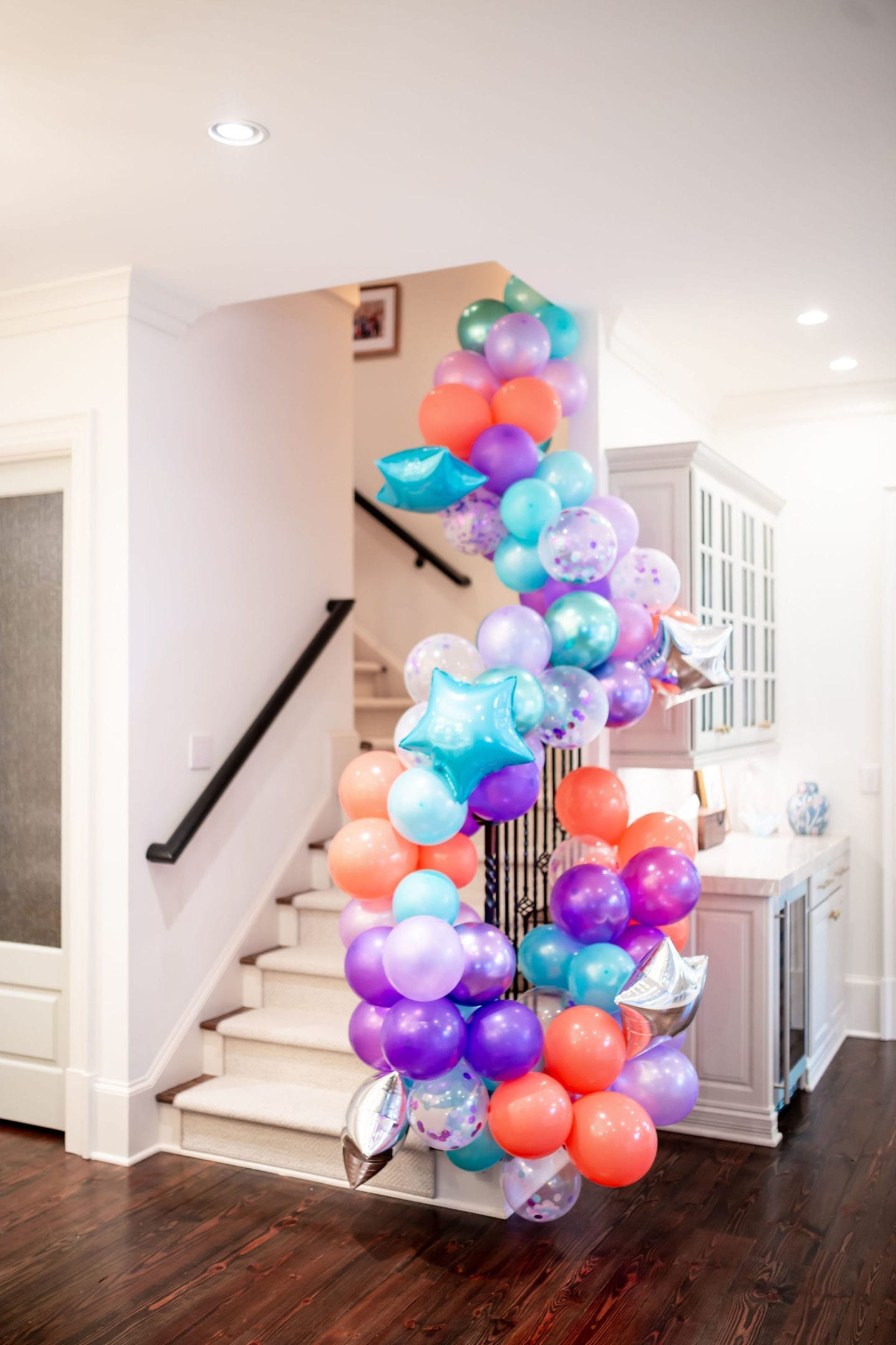 We threw a COVID surprise party for our daughter. To make it special we had awesome party balloon decorations! Sharing some fun balloon decoration ideas! I've linked everything used here for the balloon garland kit and a DIY balloon garland fun-filled party!