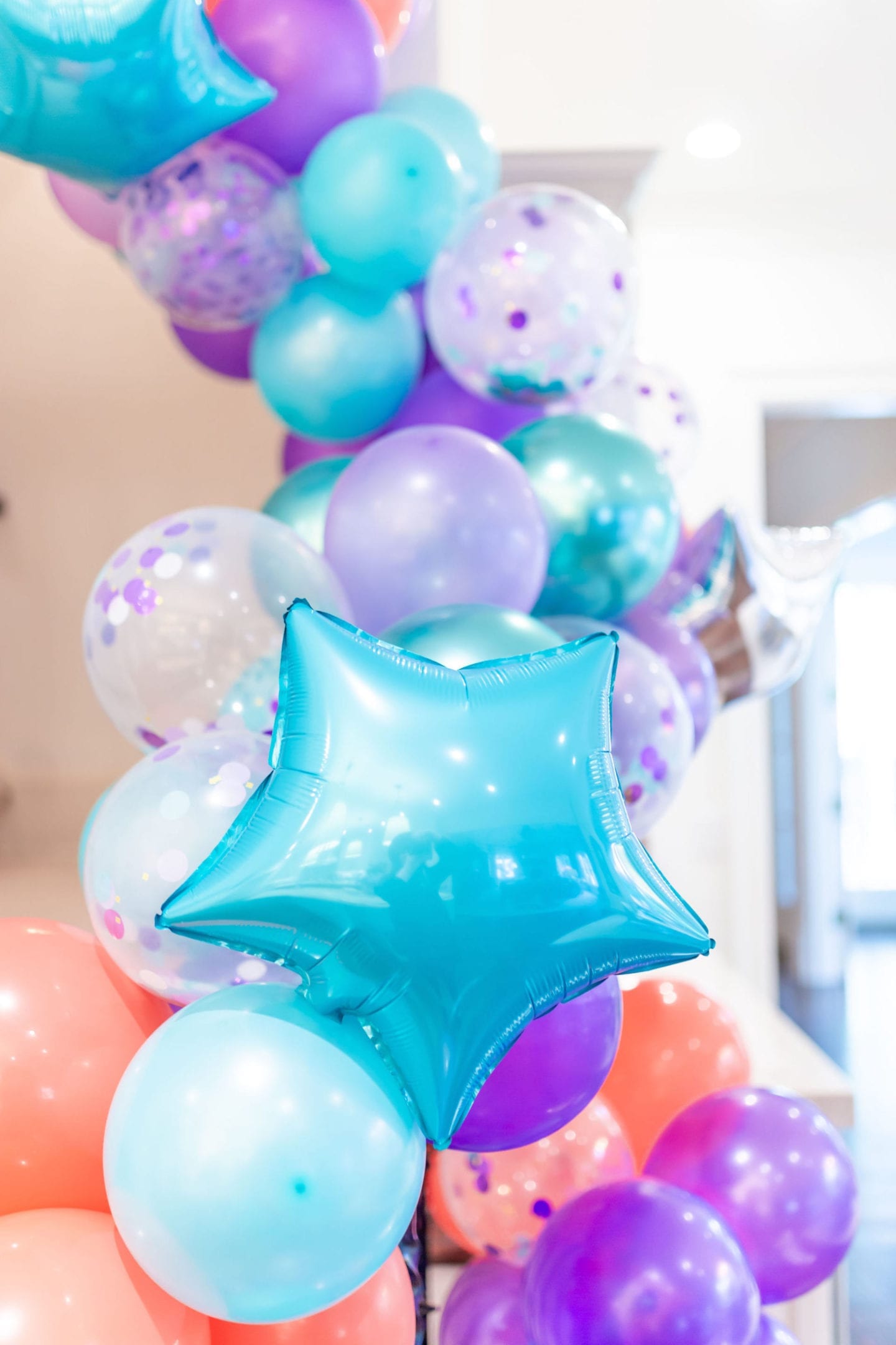 We threw a COVID surprise party for our daughter. To make it special we had awesome party balloon decorations! Sharing some fun balloon decoration ideas! I've linked everything used here for the balloon garland kit and a DIY balloon garland fun-filled party!