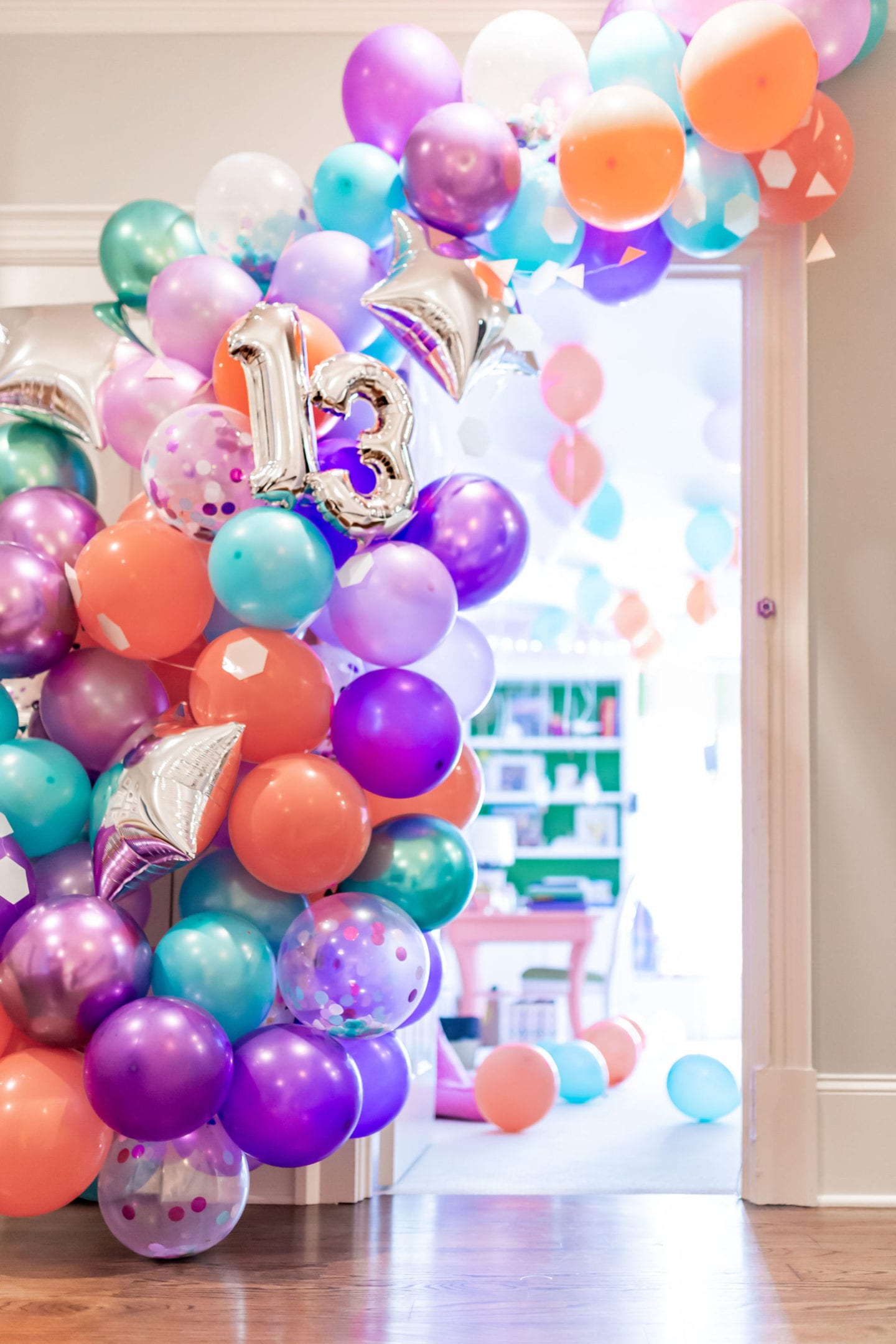 We threw a COVID surprise party for our daughter. To make it special we had awesome party balloon decorations! Sharing some fun balloon decoration ideas! I've linked everything used here for the balloon garland kit and a DIY balloon garland fun-filled party!
