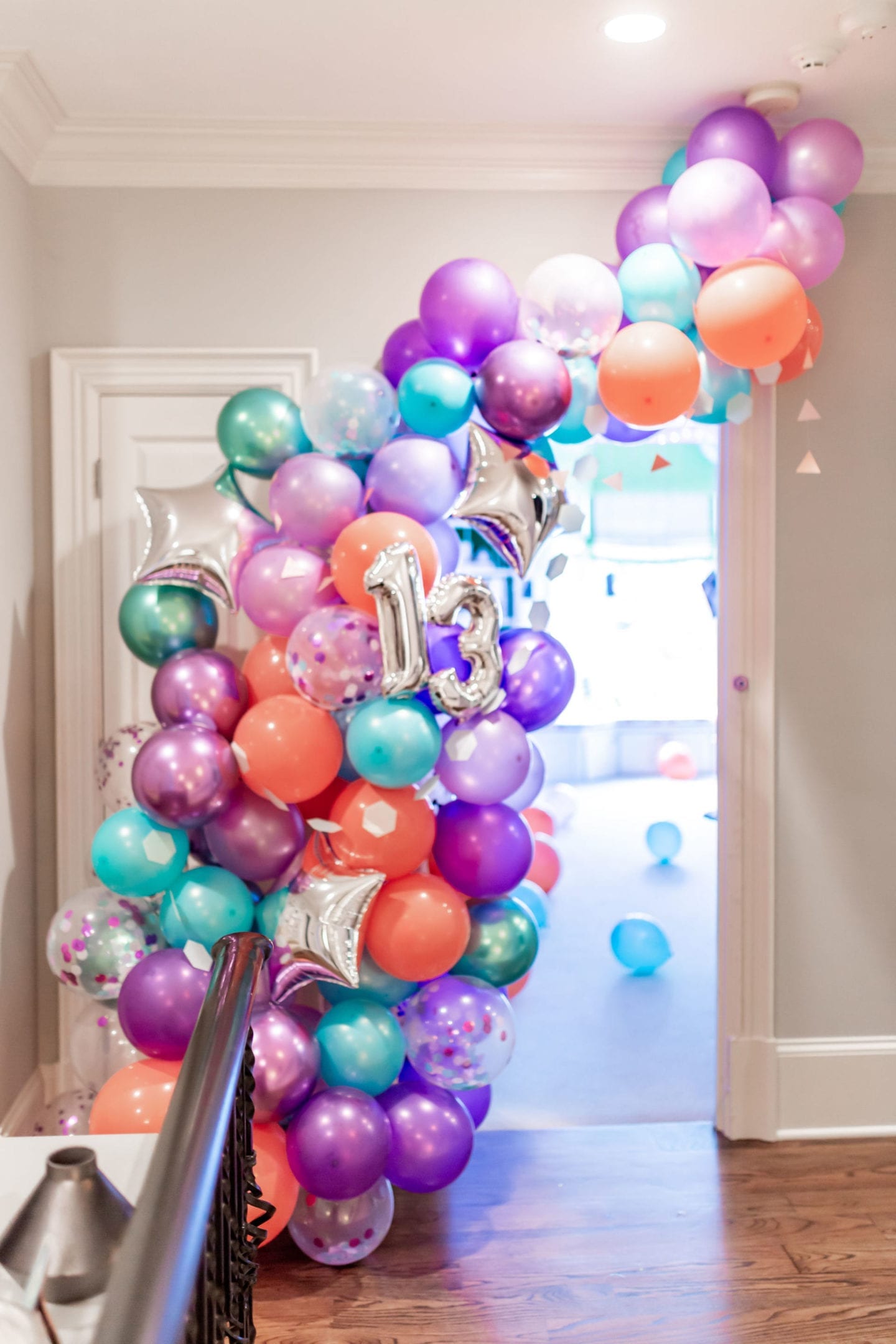 We threw a COVID surprise party for our daughter. To make it special we had awesome party balloon decorations! Sharing some fun balloon decoration ideas! I've linked everything used here for the balloon garland kit and a DIY balloon garland fun-filled party!